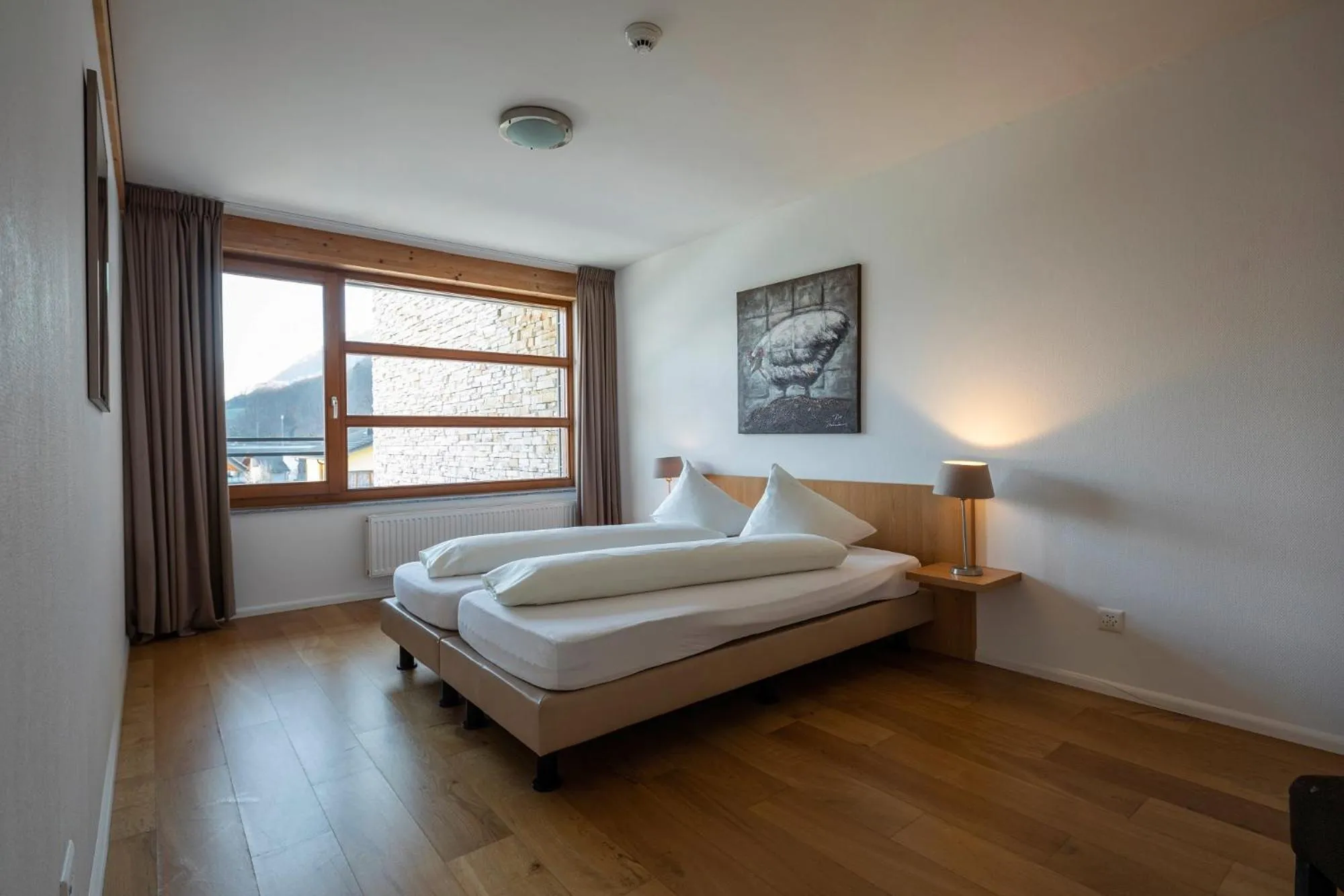 Photo of the whole room, Bed in Marina Walensee Hotel