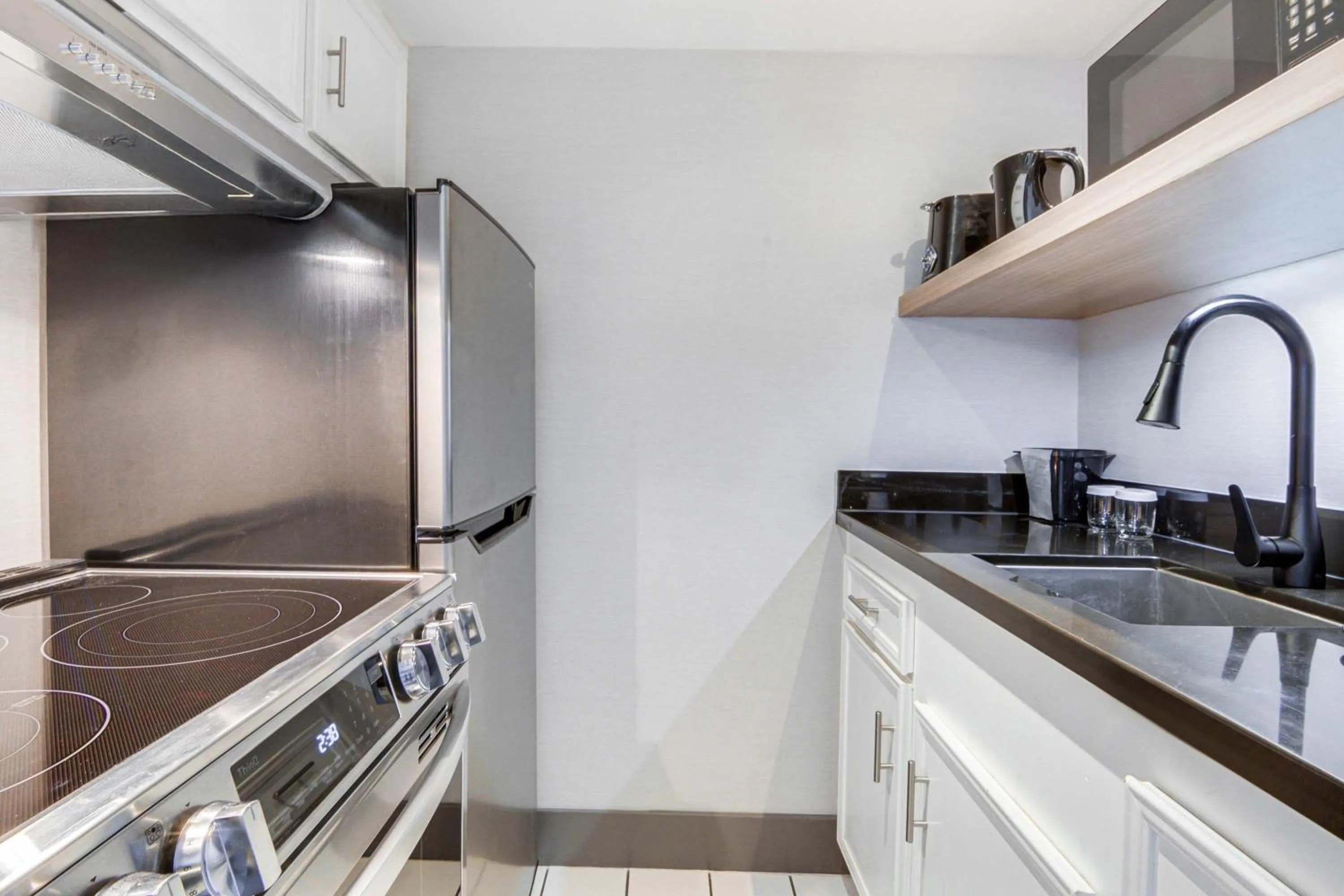Kitchen or kitchenette in Sandman Hotel & Suites Kelowna