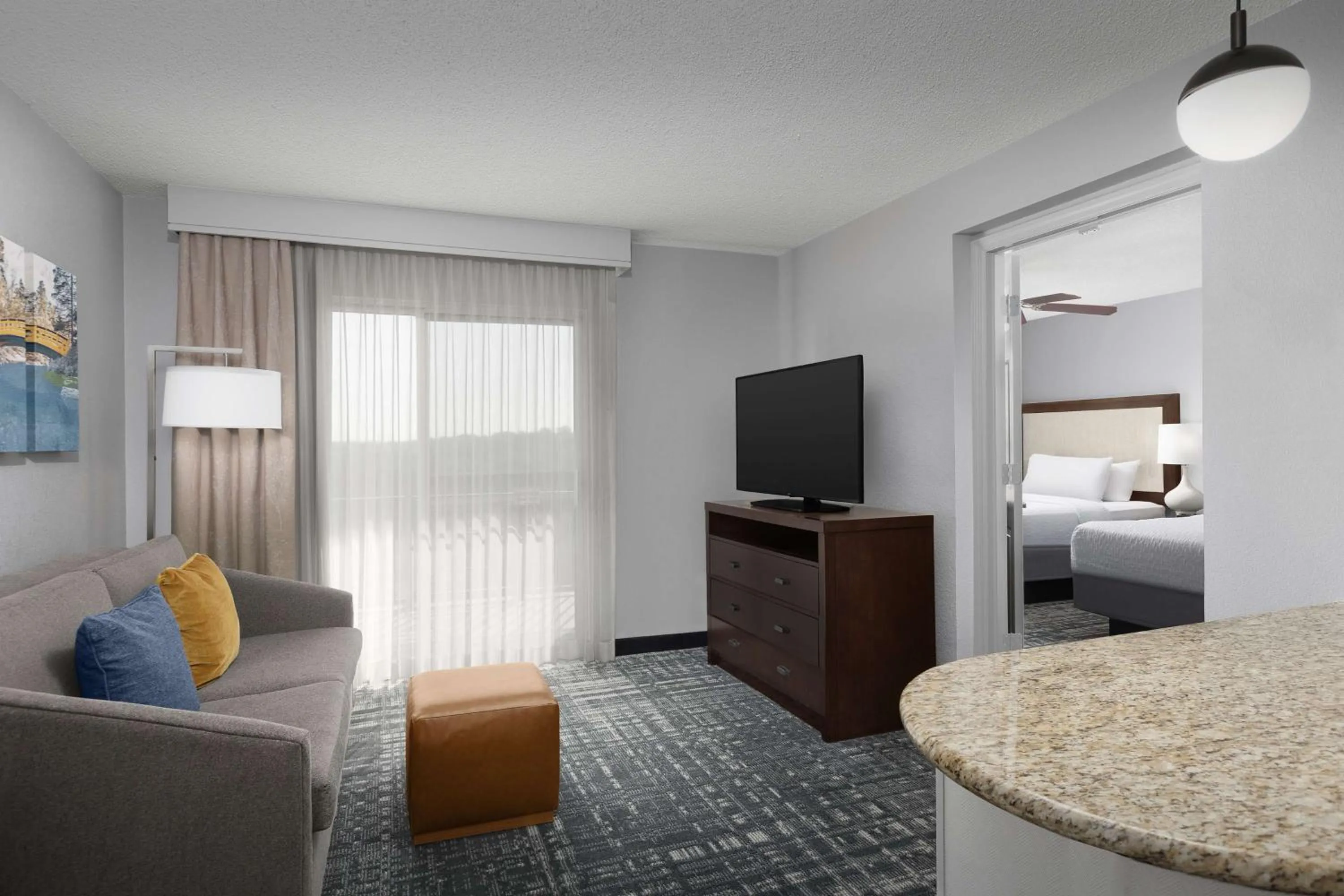 Living room, Bed in Homewood Suites by Hilton Raleigh-Durham Airport at RTP