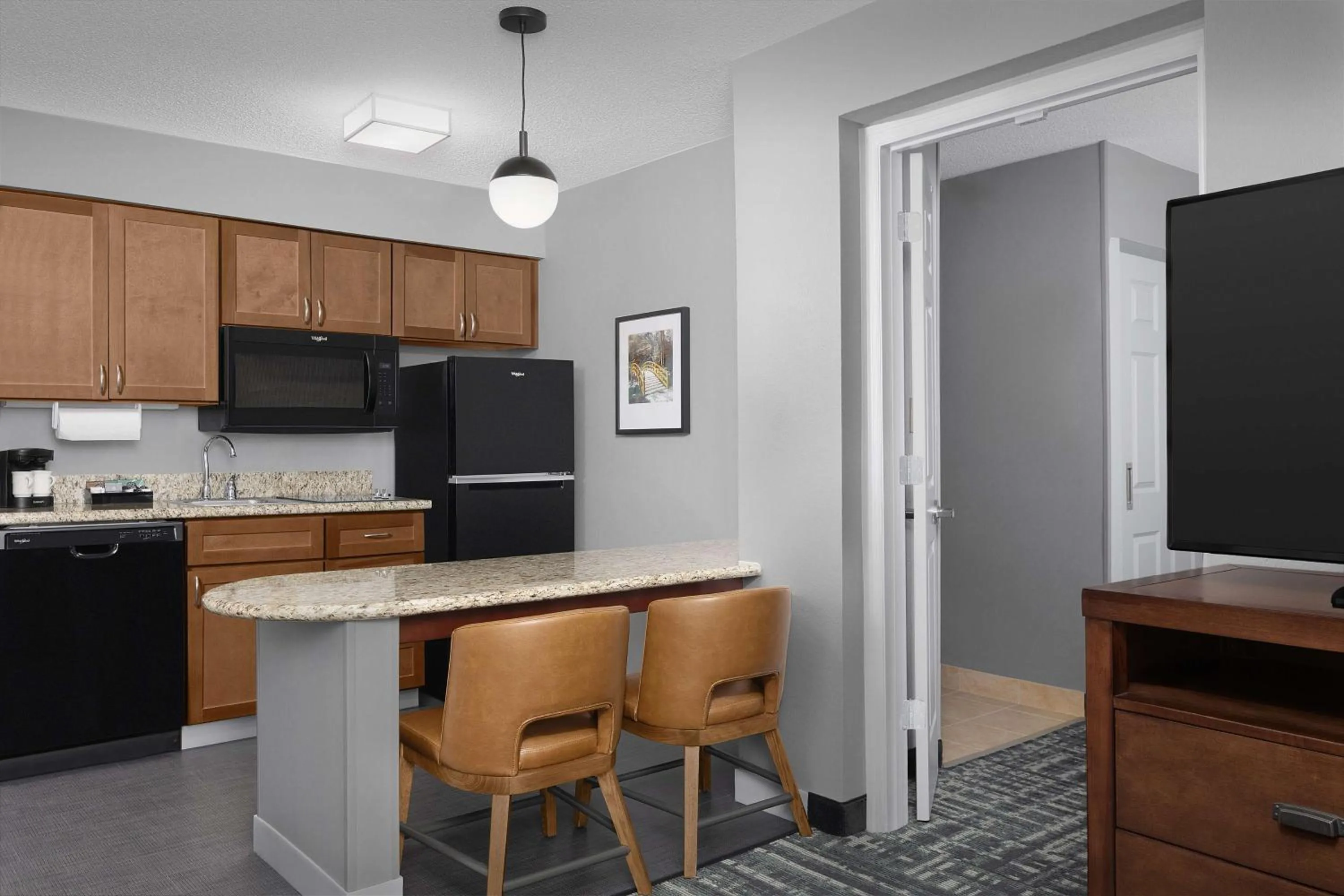 Kitchen or kitchenette in Homewood Suites by Hilton Raleigh-Durham Airport at RTP