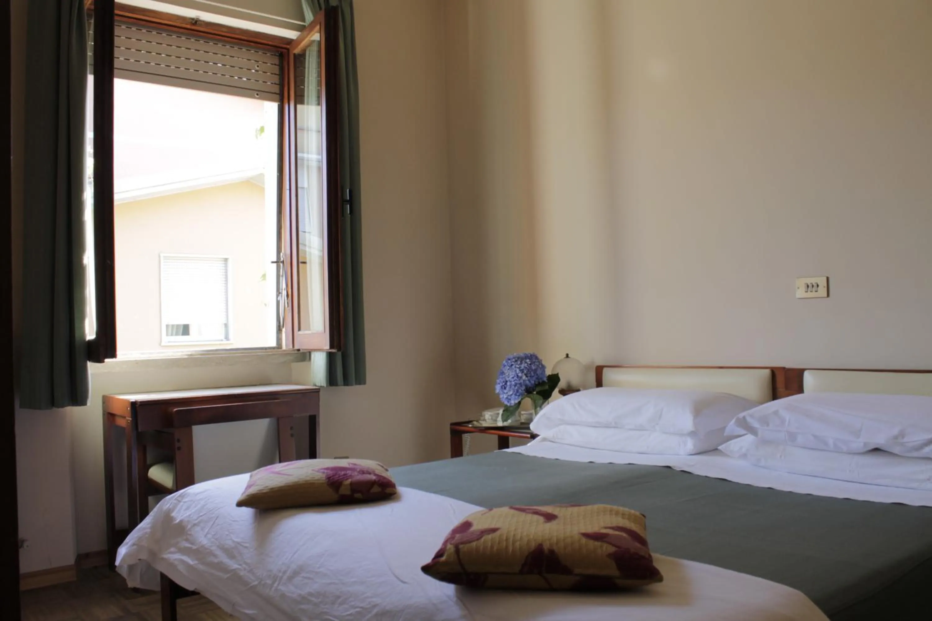 Bedroom in Hotel MariaLetizia