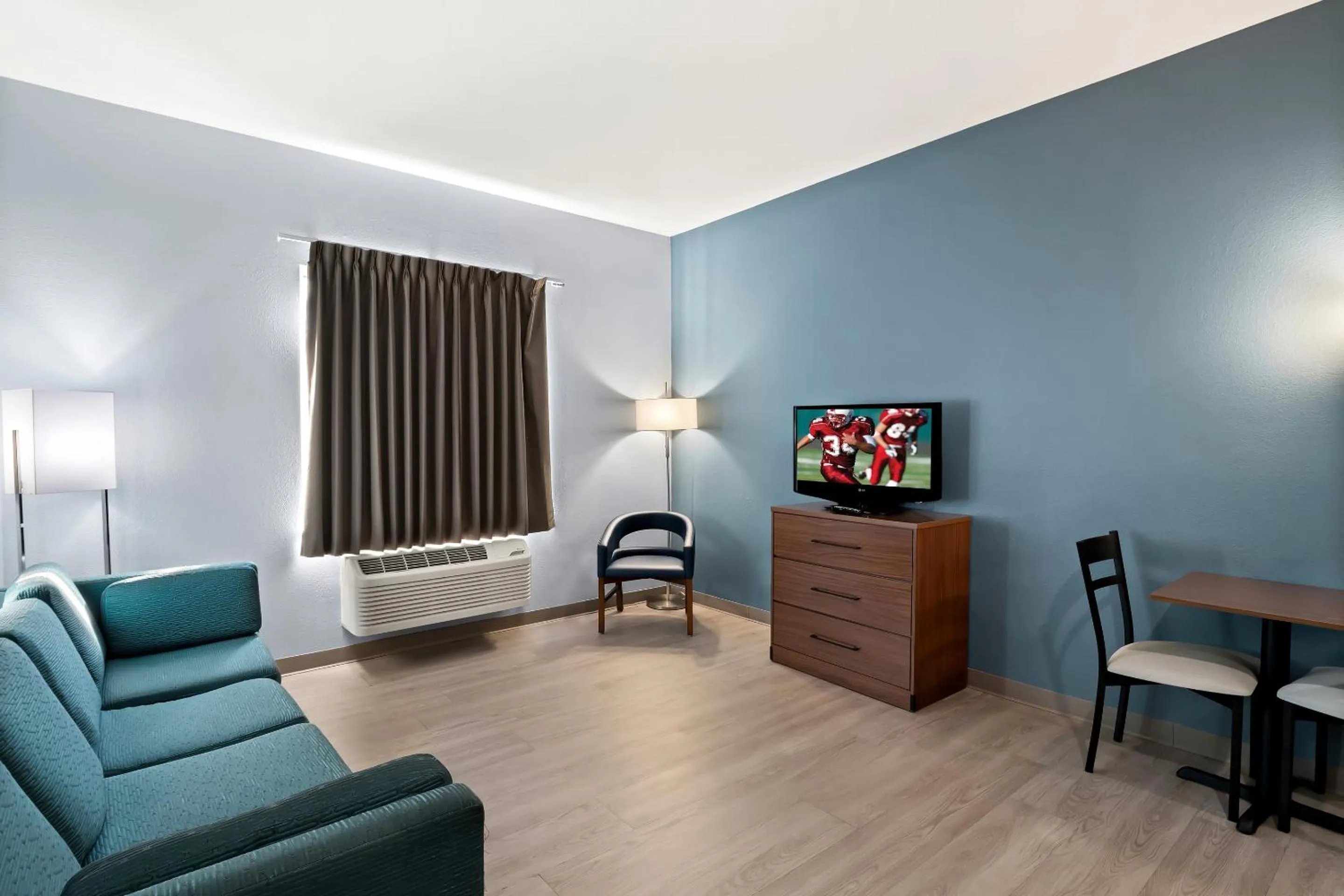 Photo of the whole room in HomeTowne Studios by Red Roof East Lansing - Okemos