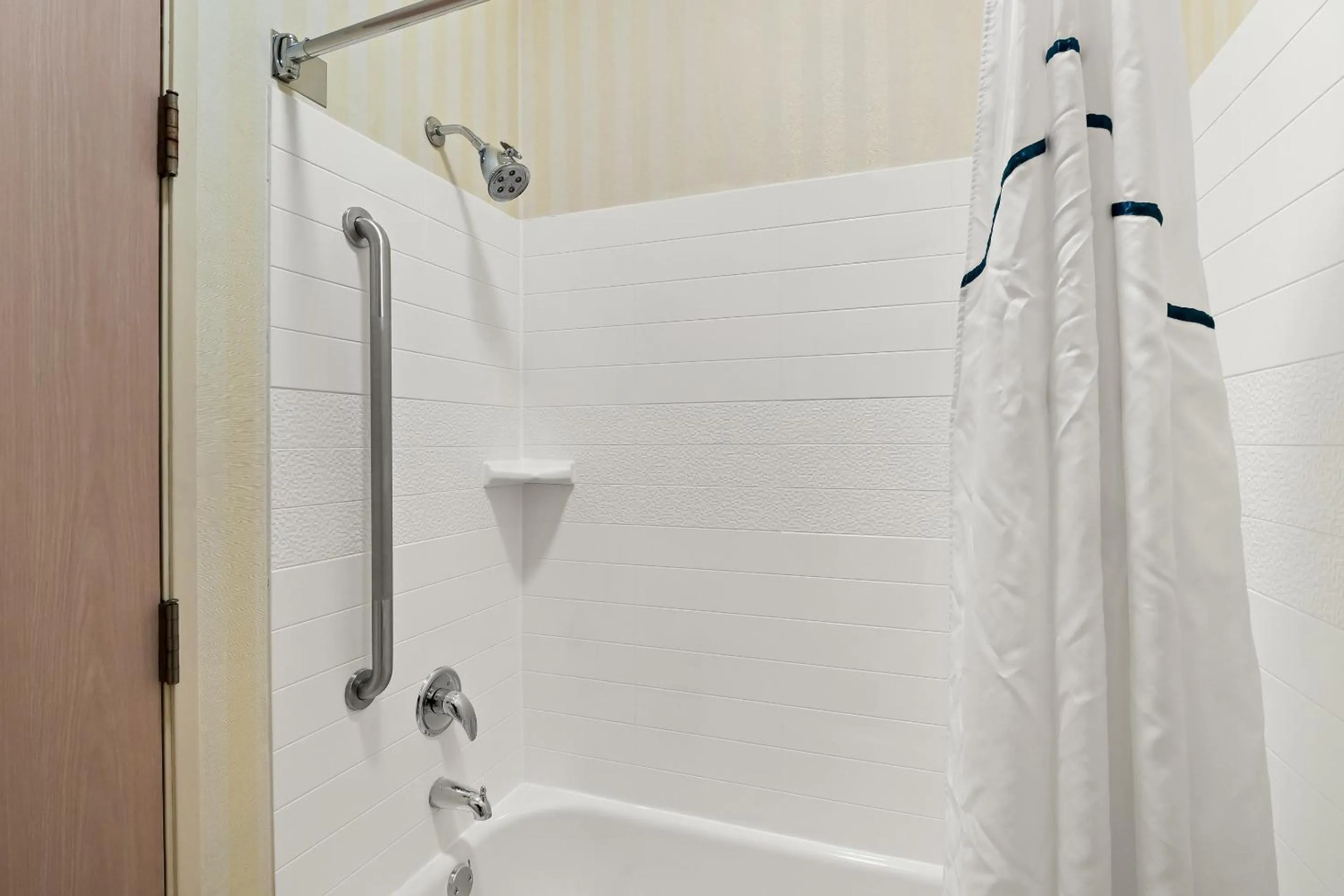 Bathroom in HomeTowne Studios by Red Roof East Lansing - Okemos