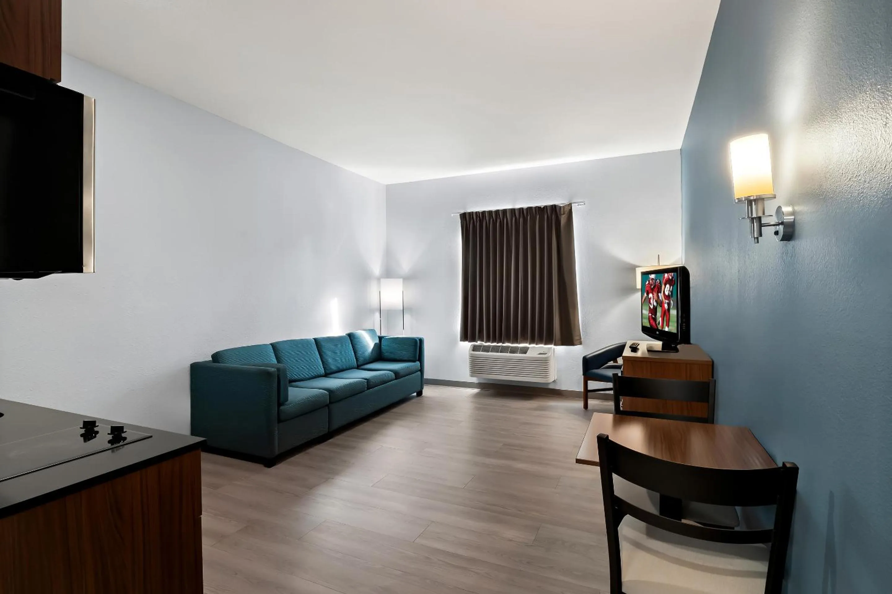 Photo of the whole room in HomeTowne Studios by Red Roof East Lansing - Okemos