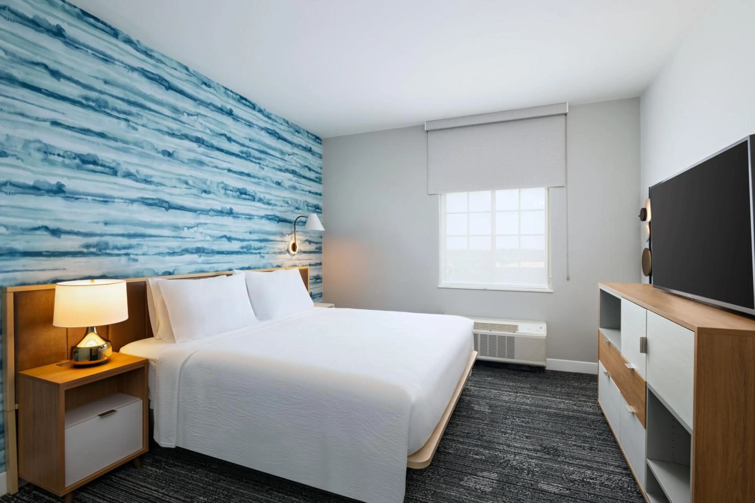 Bedroom, Bed in Woodland Suites