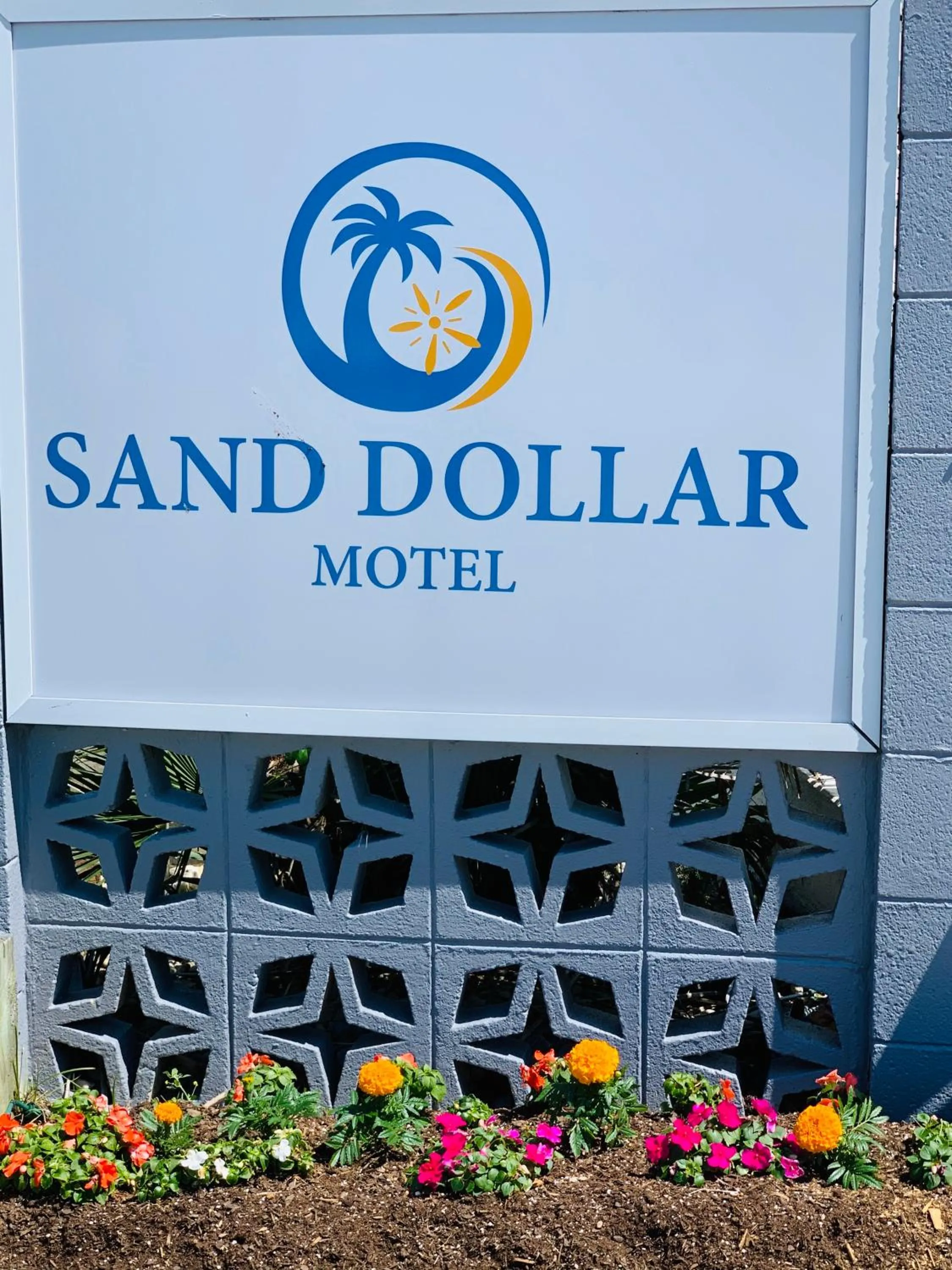 Property logo or sign in Sand Dollar Motel