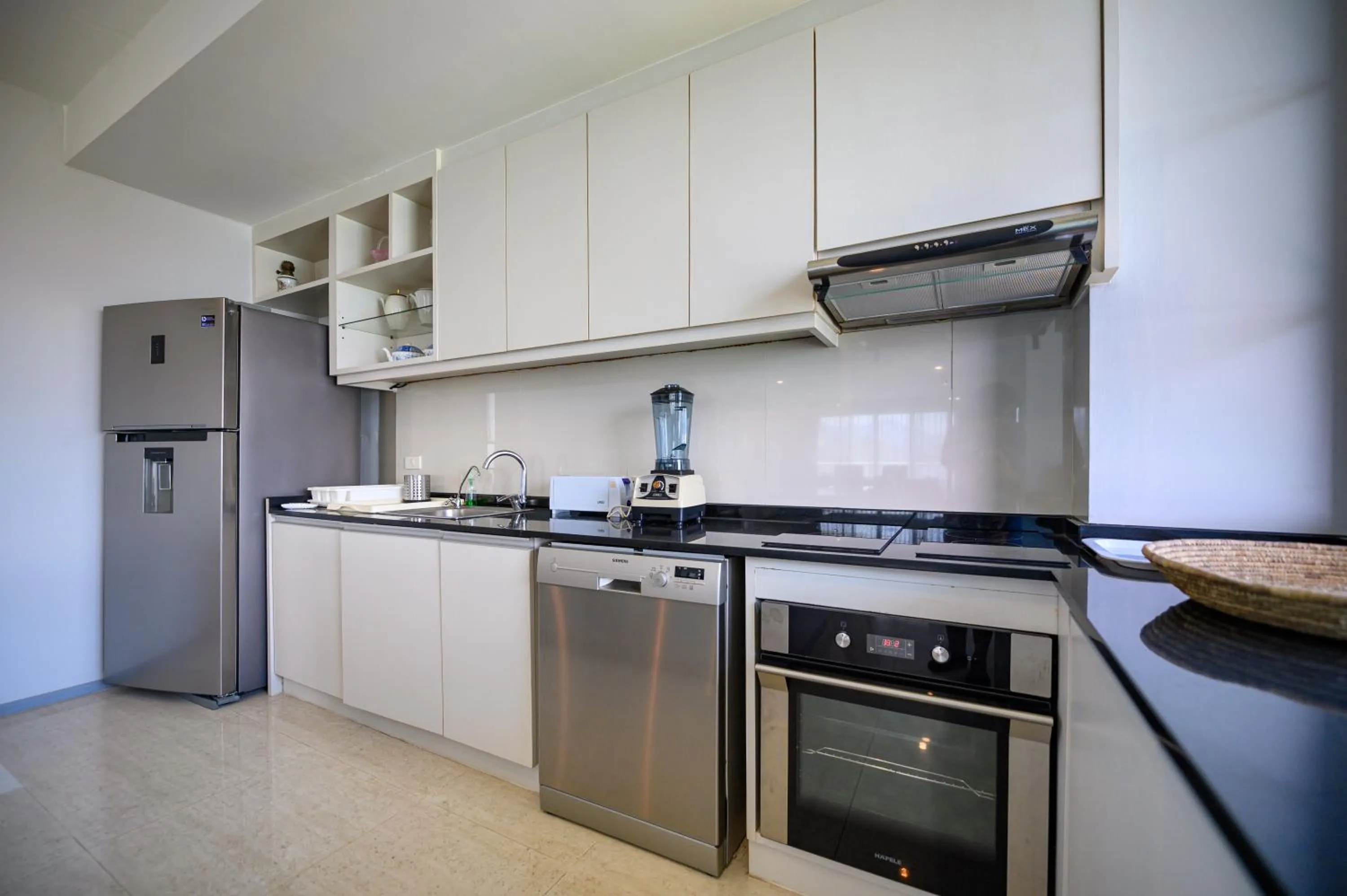 kitchen in 6th Avenue Surin Beach - Official Account