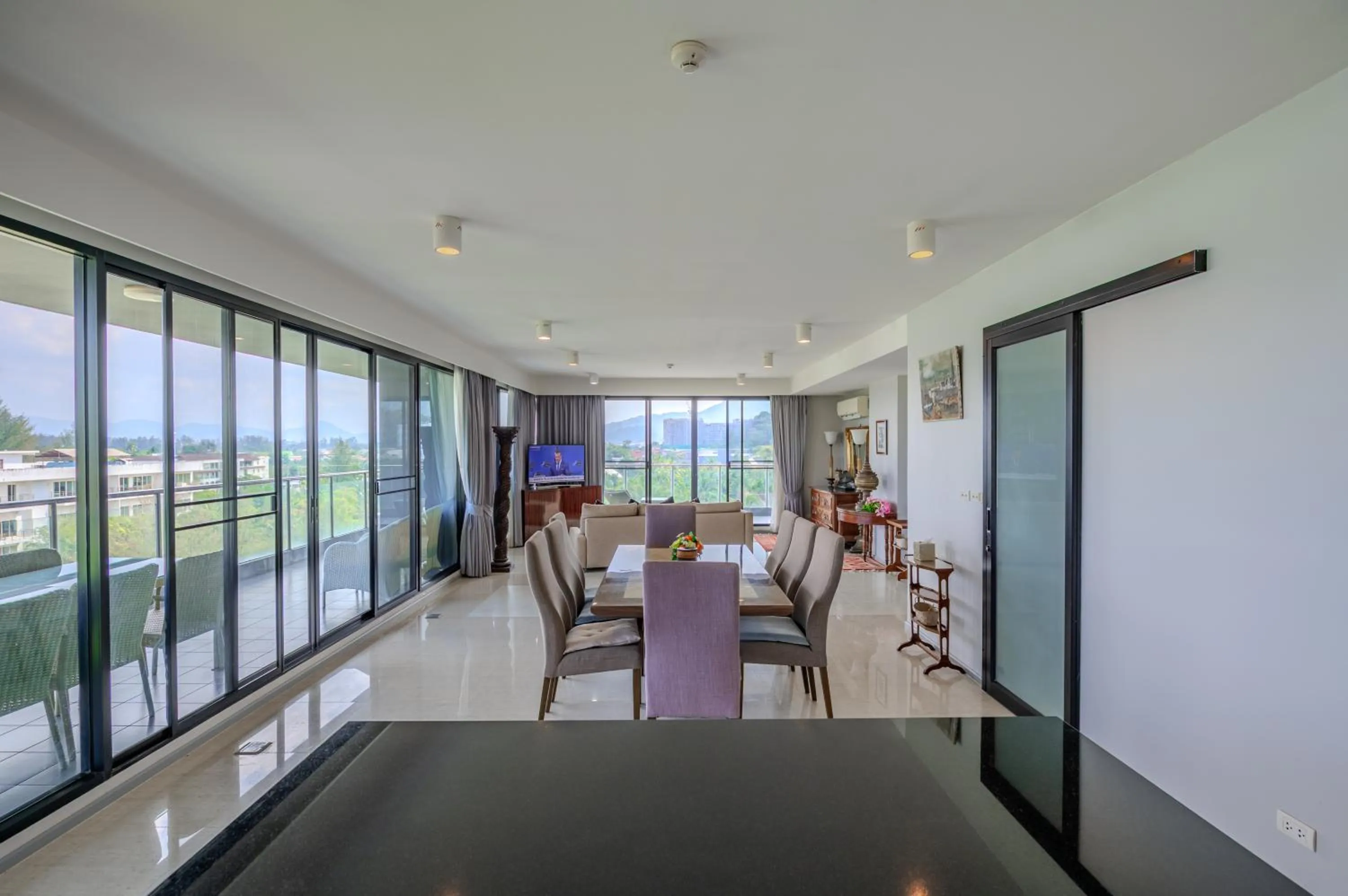 Living room in 6th Avenue Surin Beach - Official Account