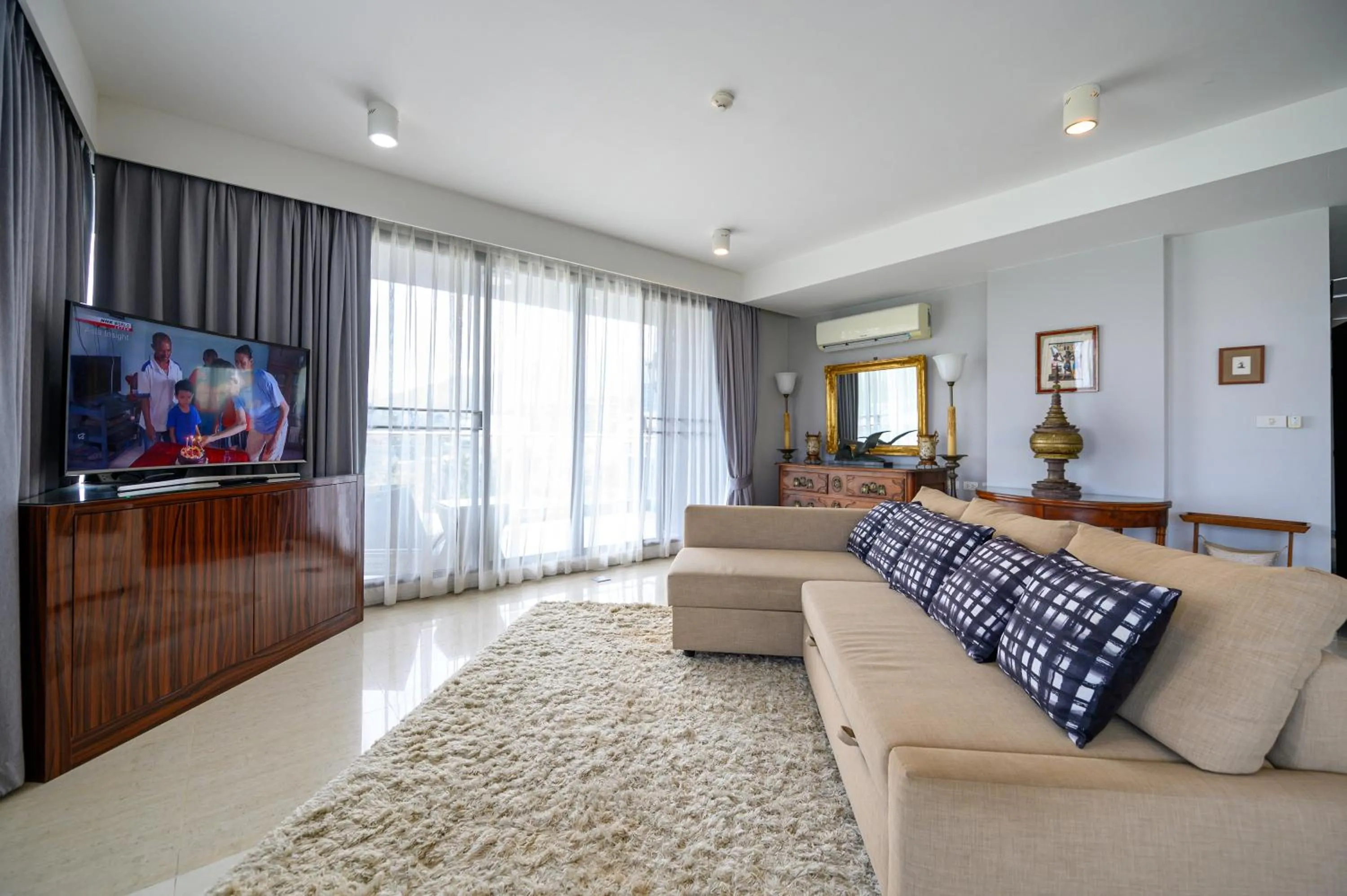 Living room in 6th Avenue Surin Beach - Official Account