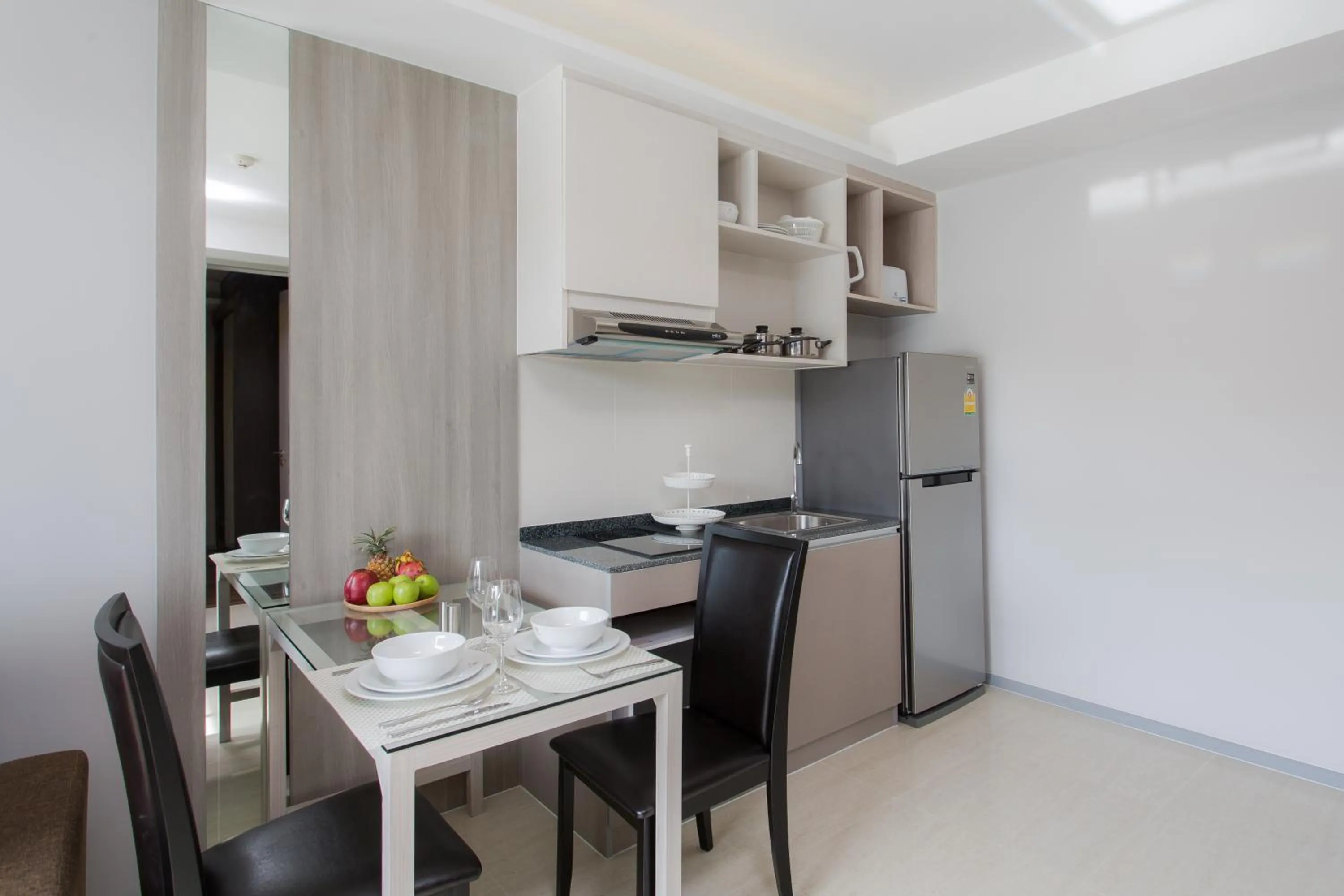 Dining area in 6th Avenue Surin Beach - Official Account