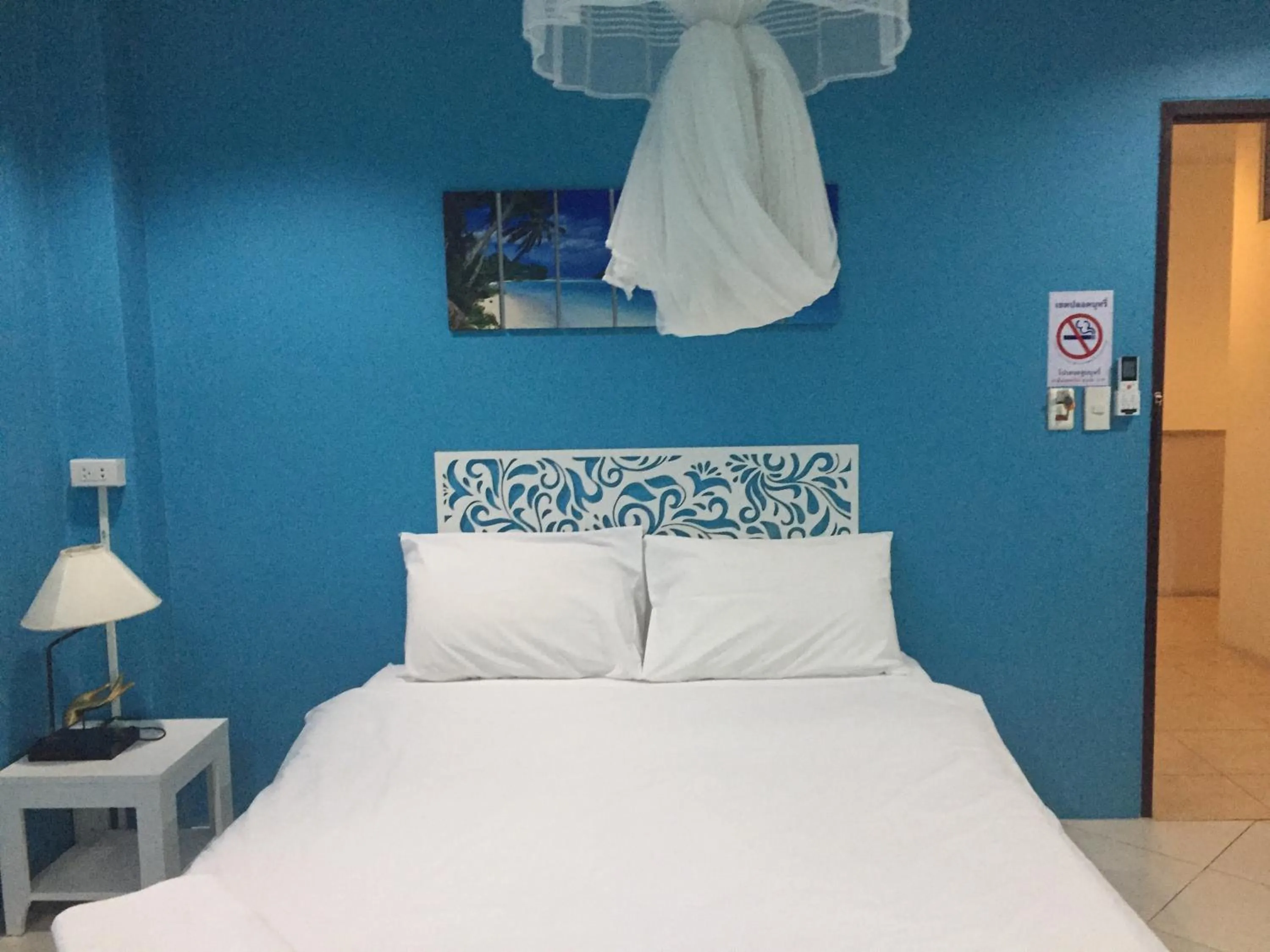 Bed in Nawaporn Place