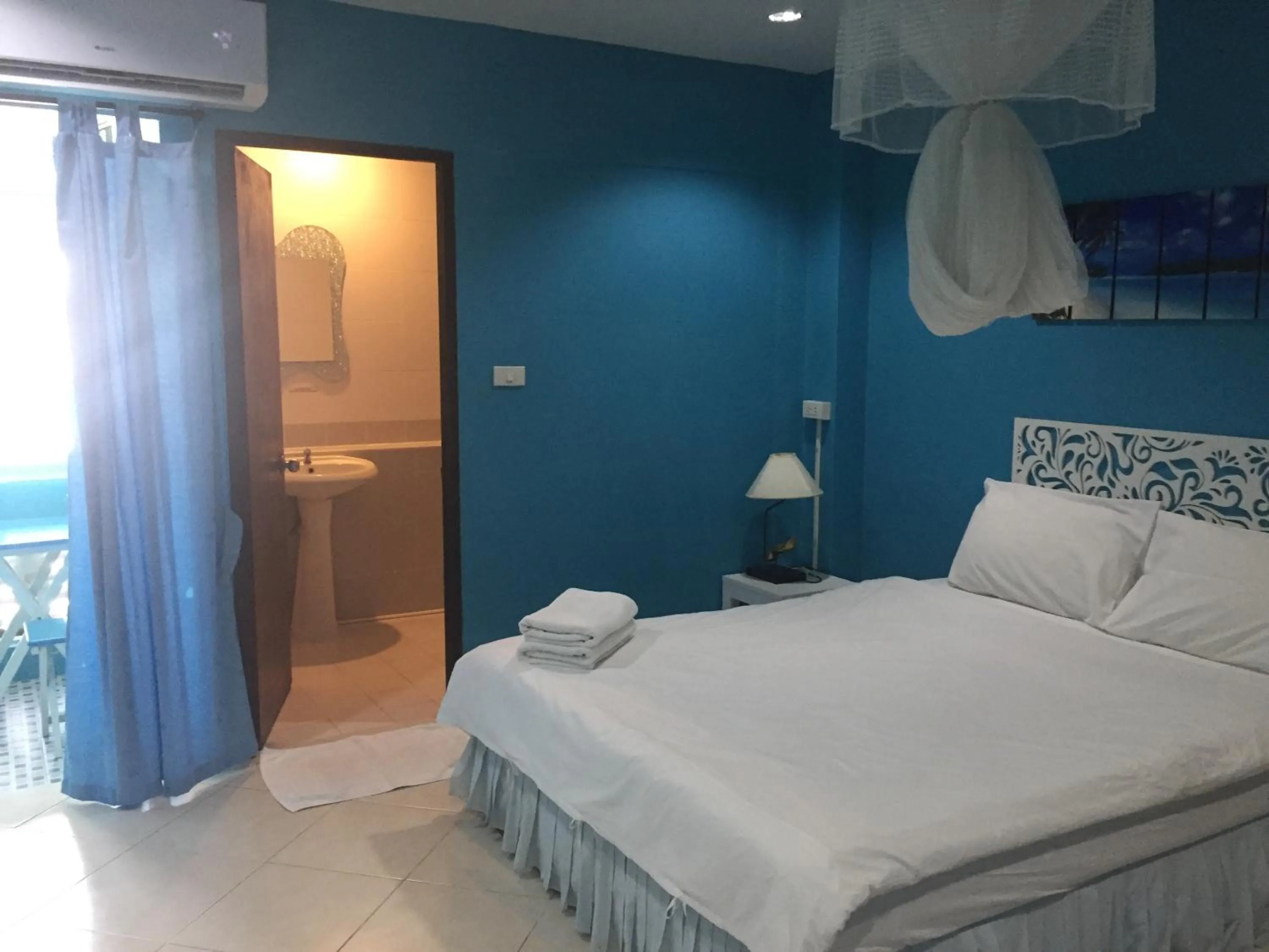 Bed in Nawaporn Place