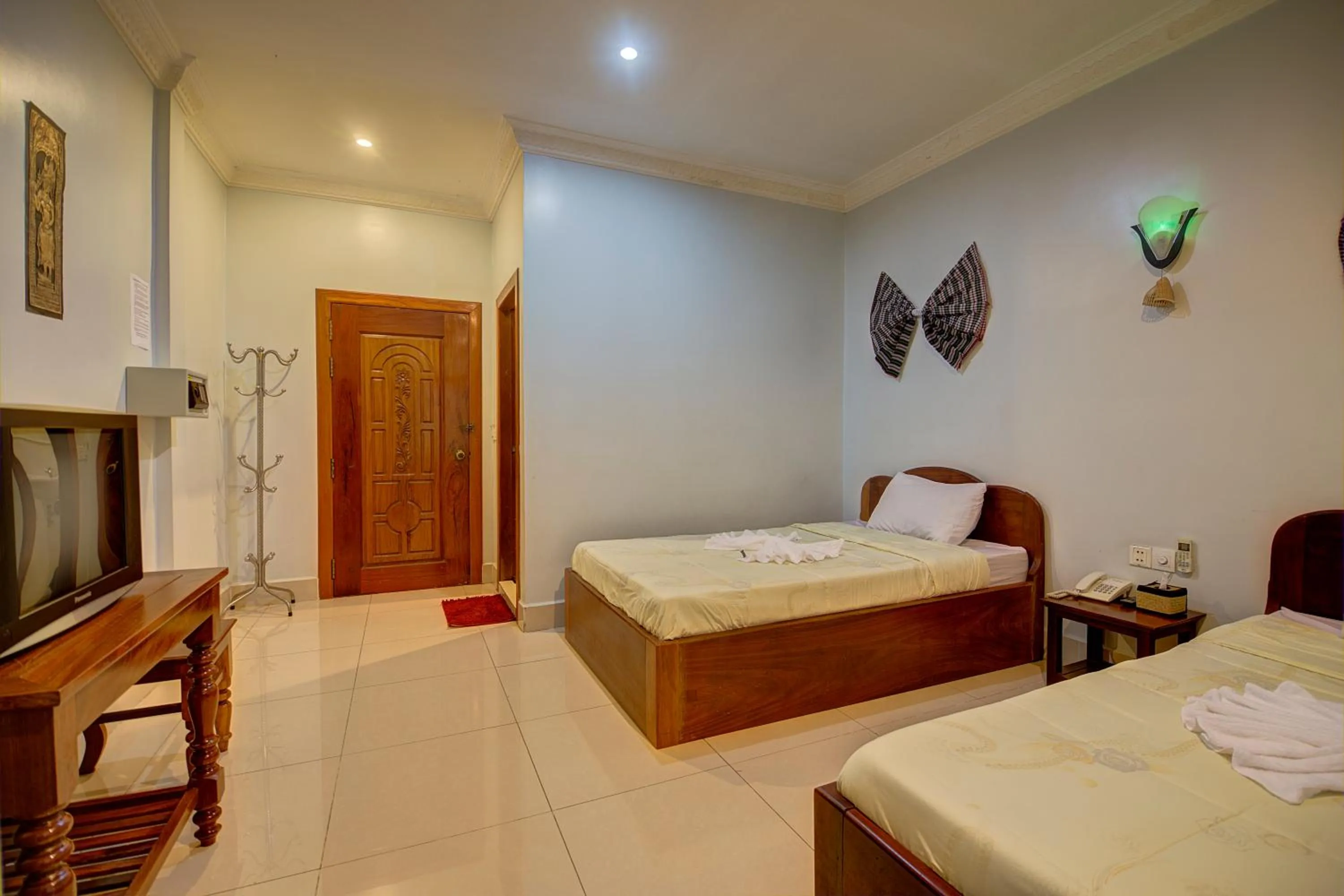 Photo of the whole room, Bed in DV Angkor Villa