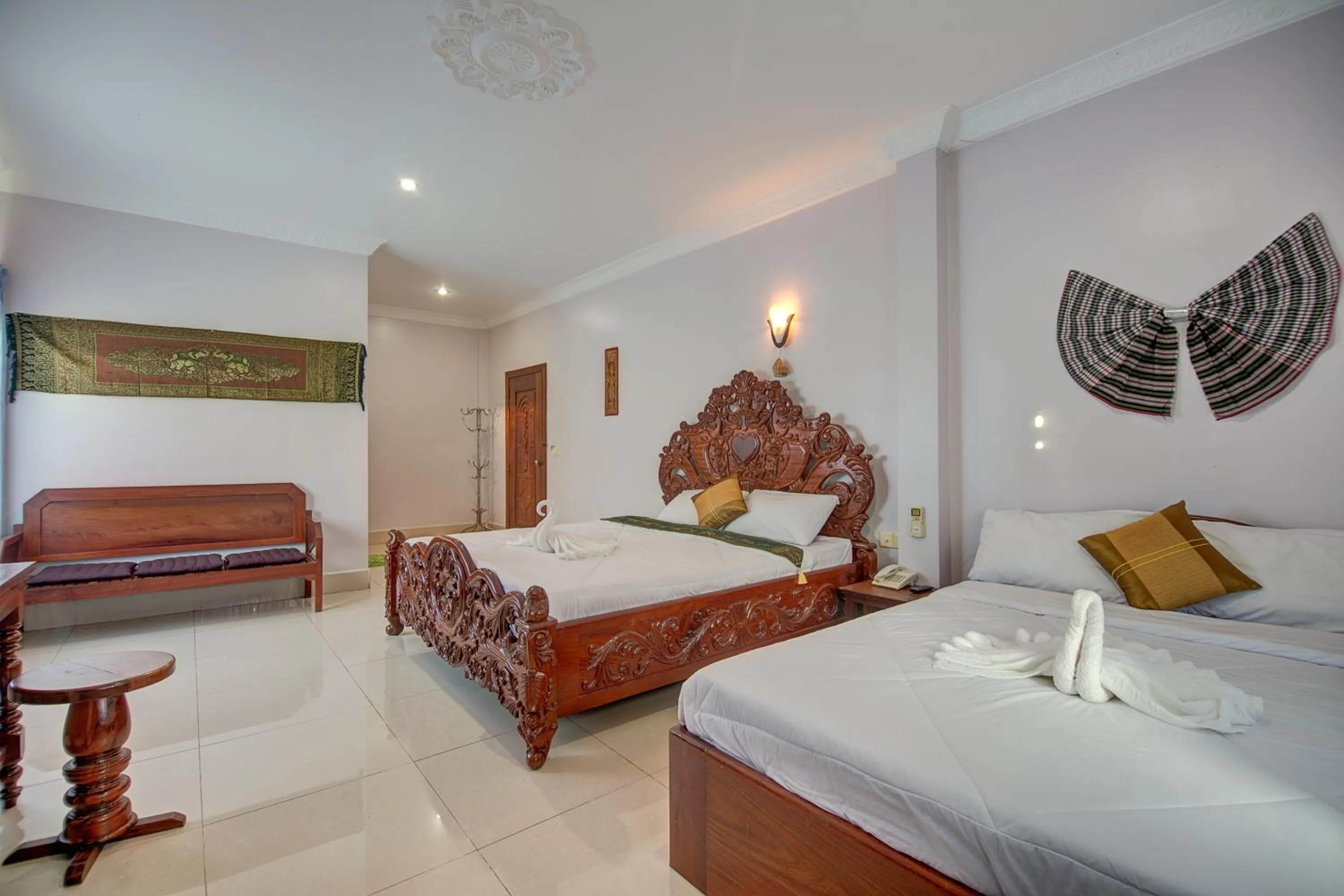 Photo of the whole room, Bed in DV Angkor Villa