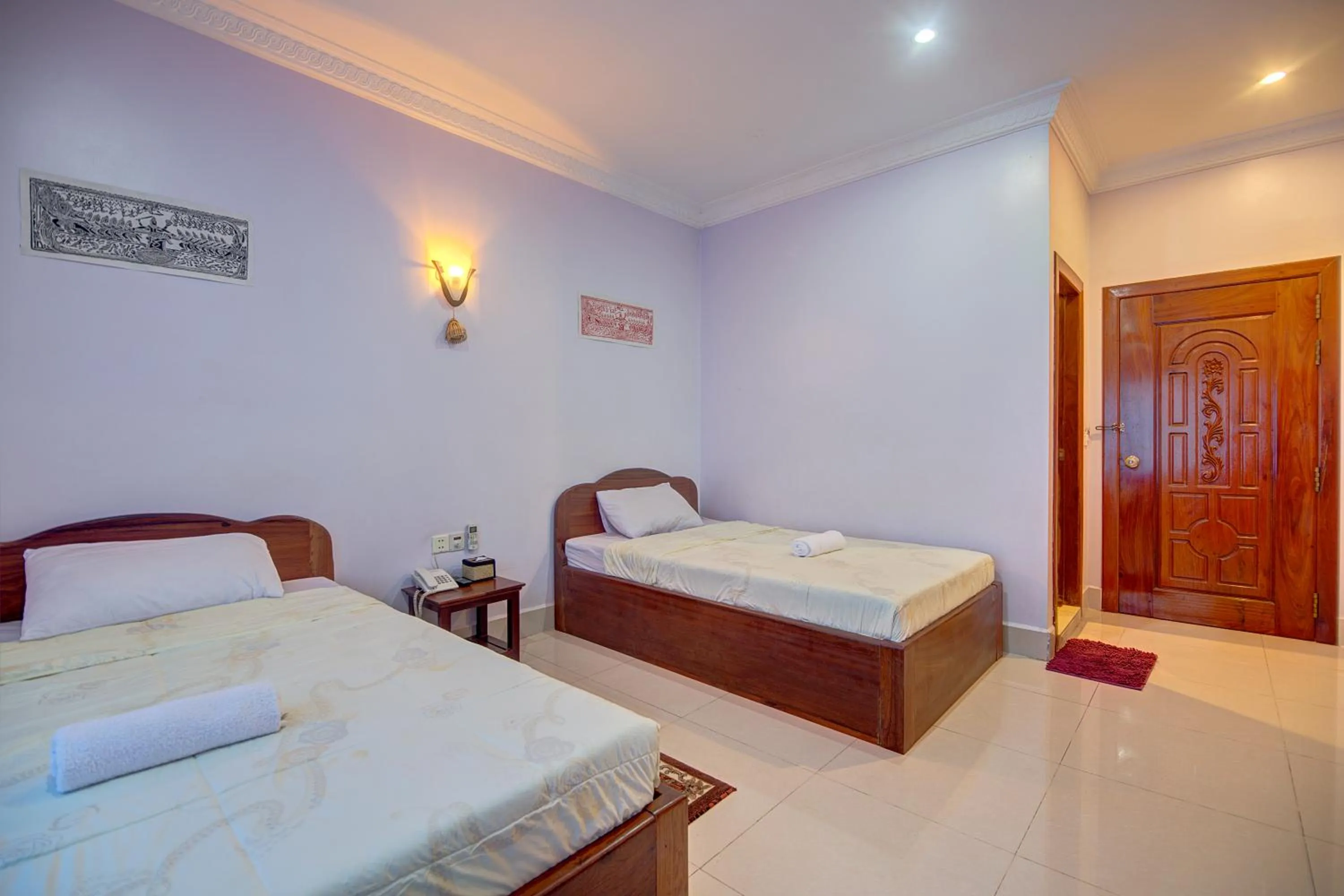 Photo of the whole room, Bed in DV Angkor Villa