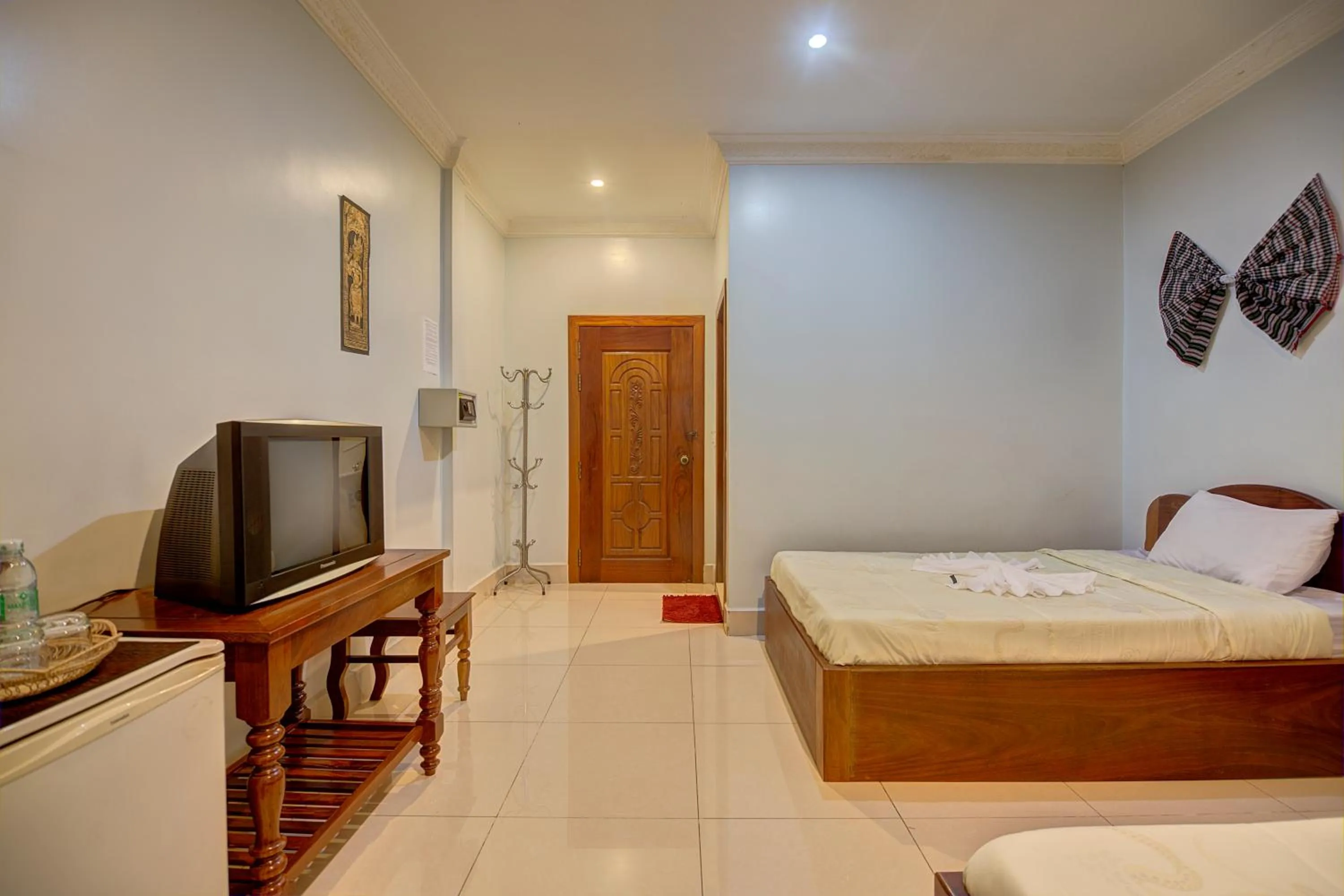 Photo of the whole room, Bed in DV Angkor Villa