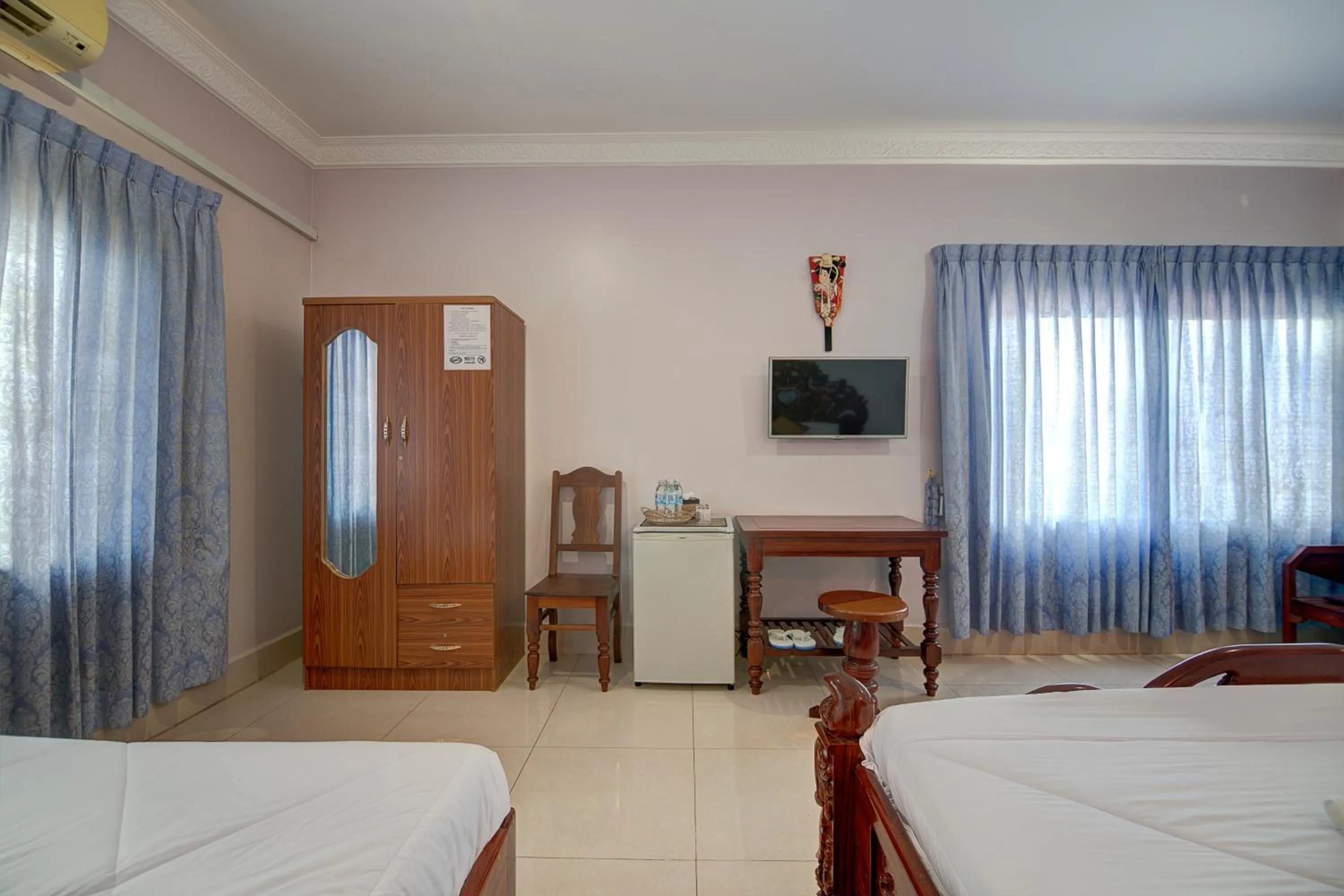 Photo of the whole room, Bed in DV Angkor Villa