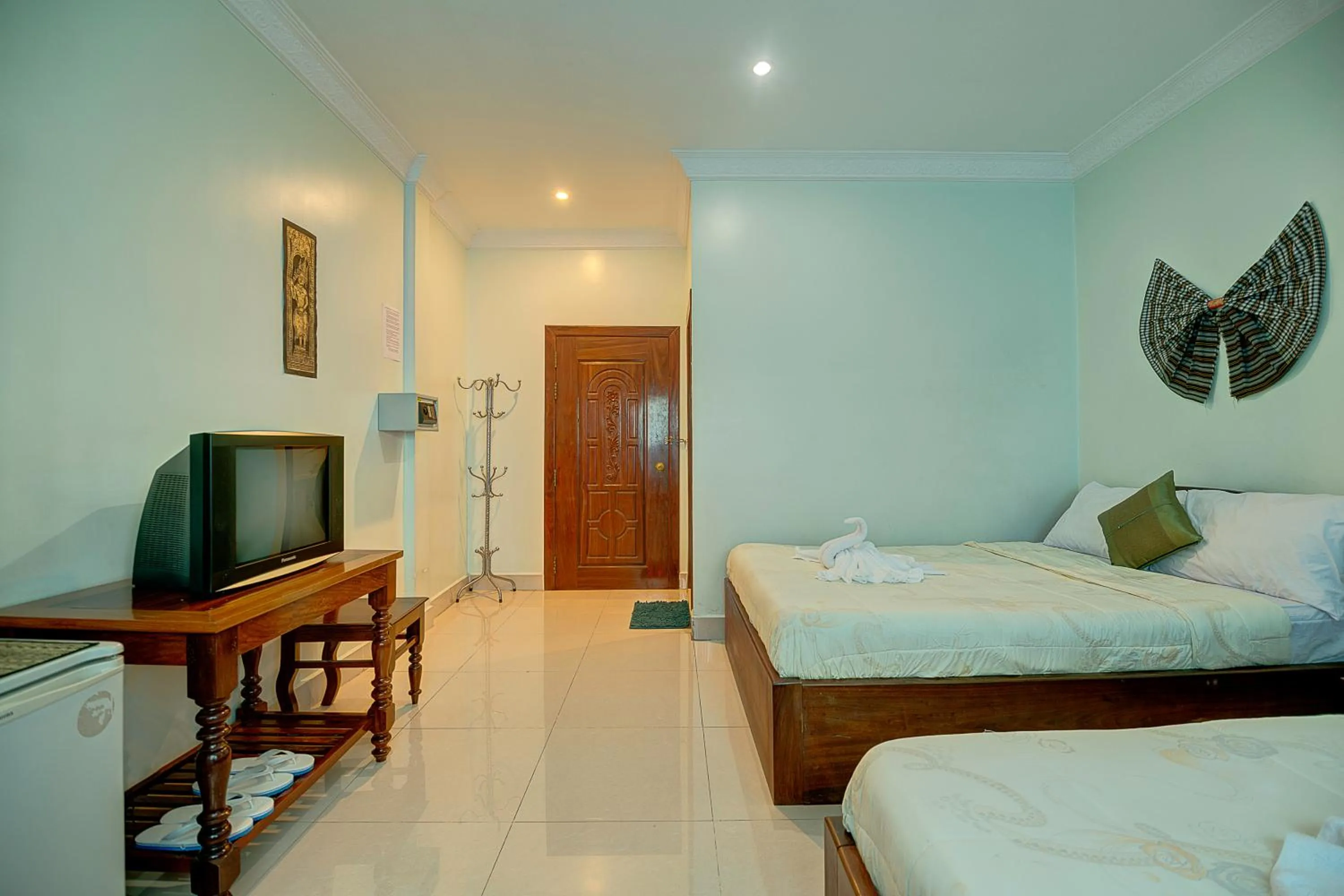 Photo of the whole room, Bed in DV Angkor Villa