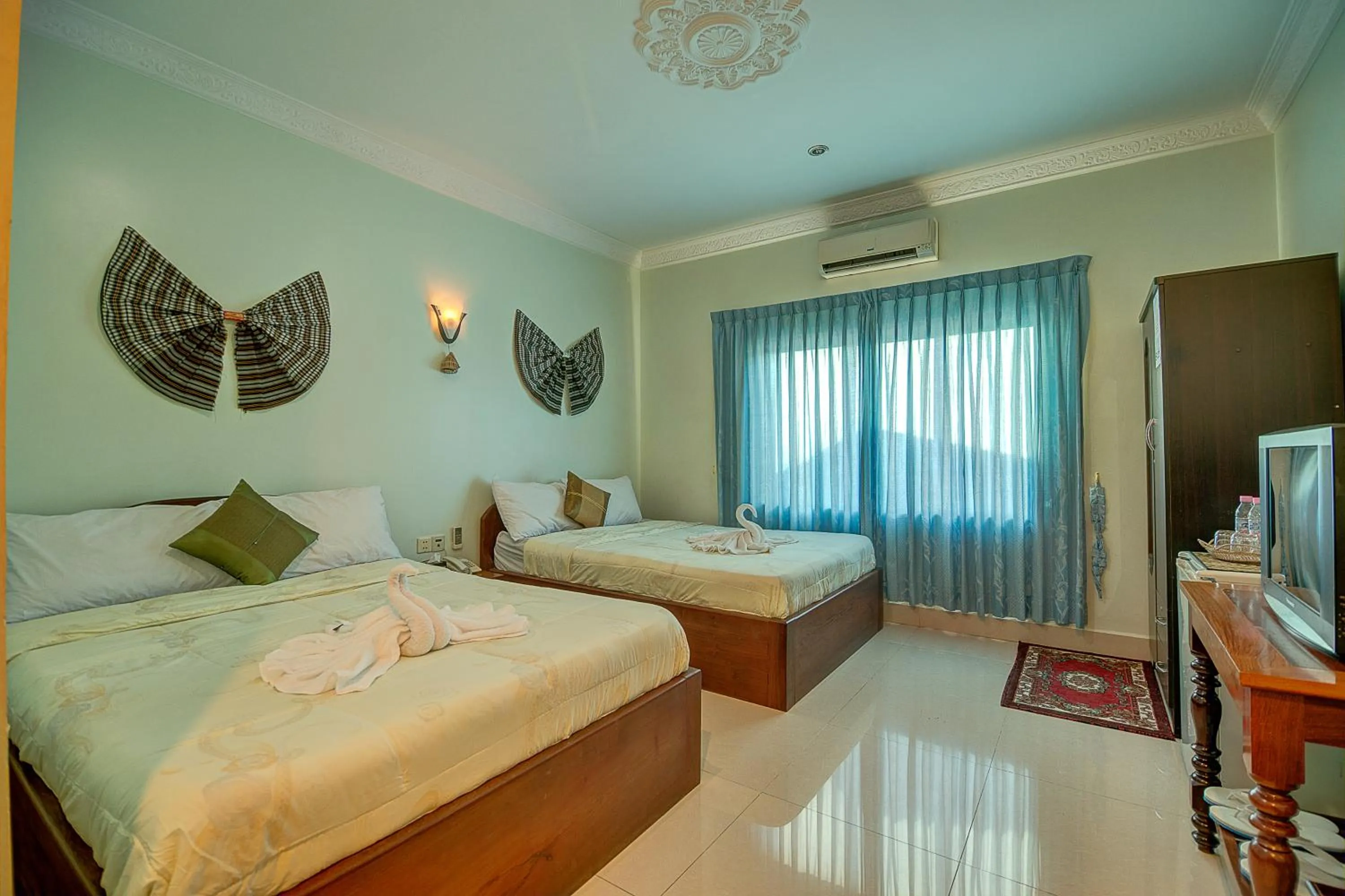 Photo of the whole room, Bed in DV Angkor Villa
