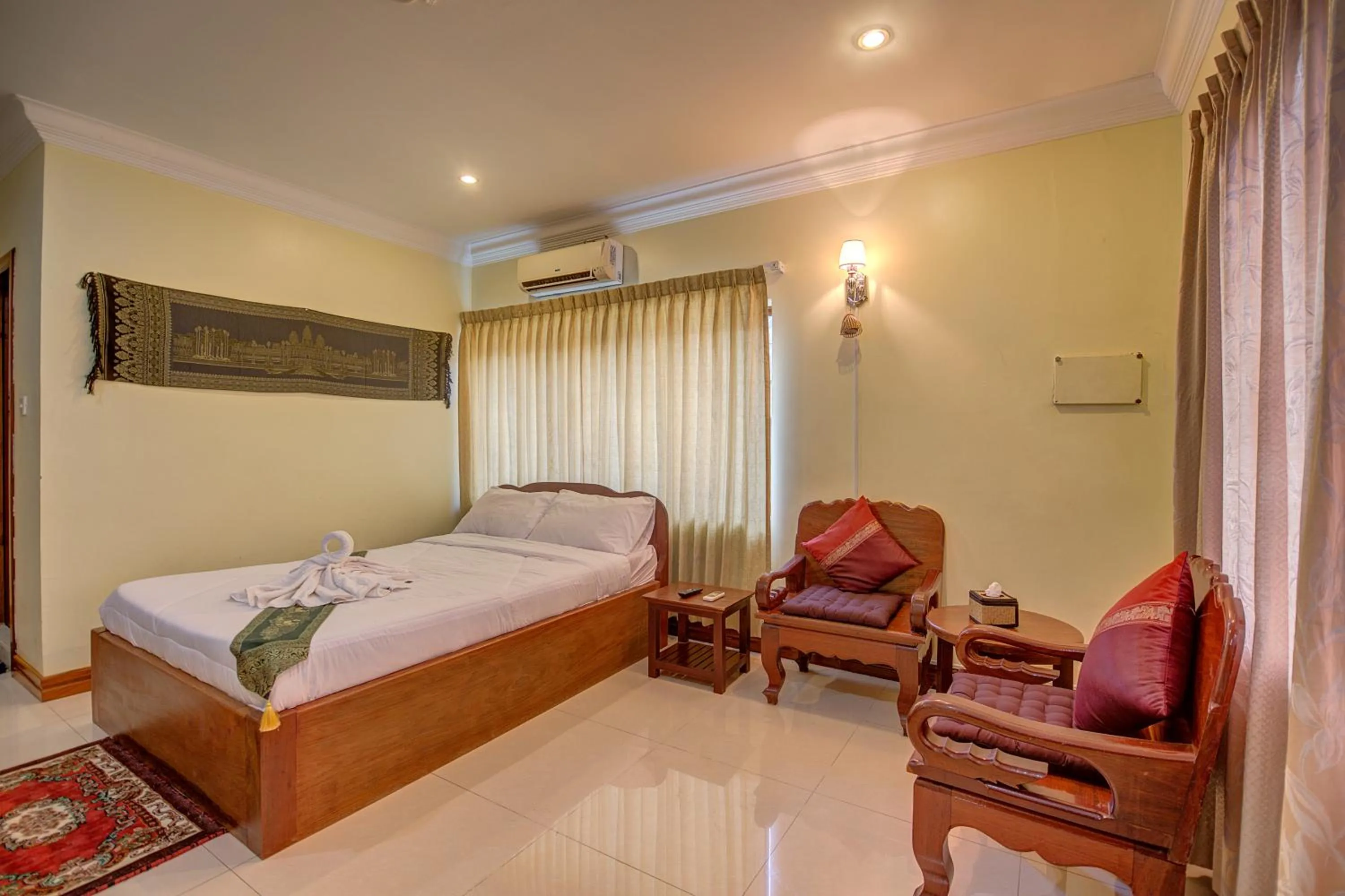 Photo of the whole room, Bed in DV Angkor Villa