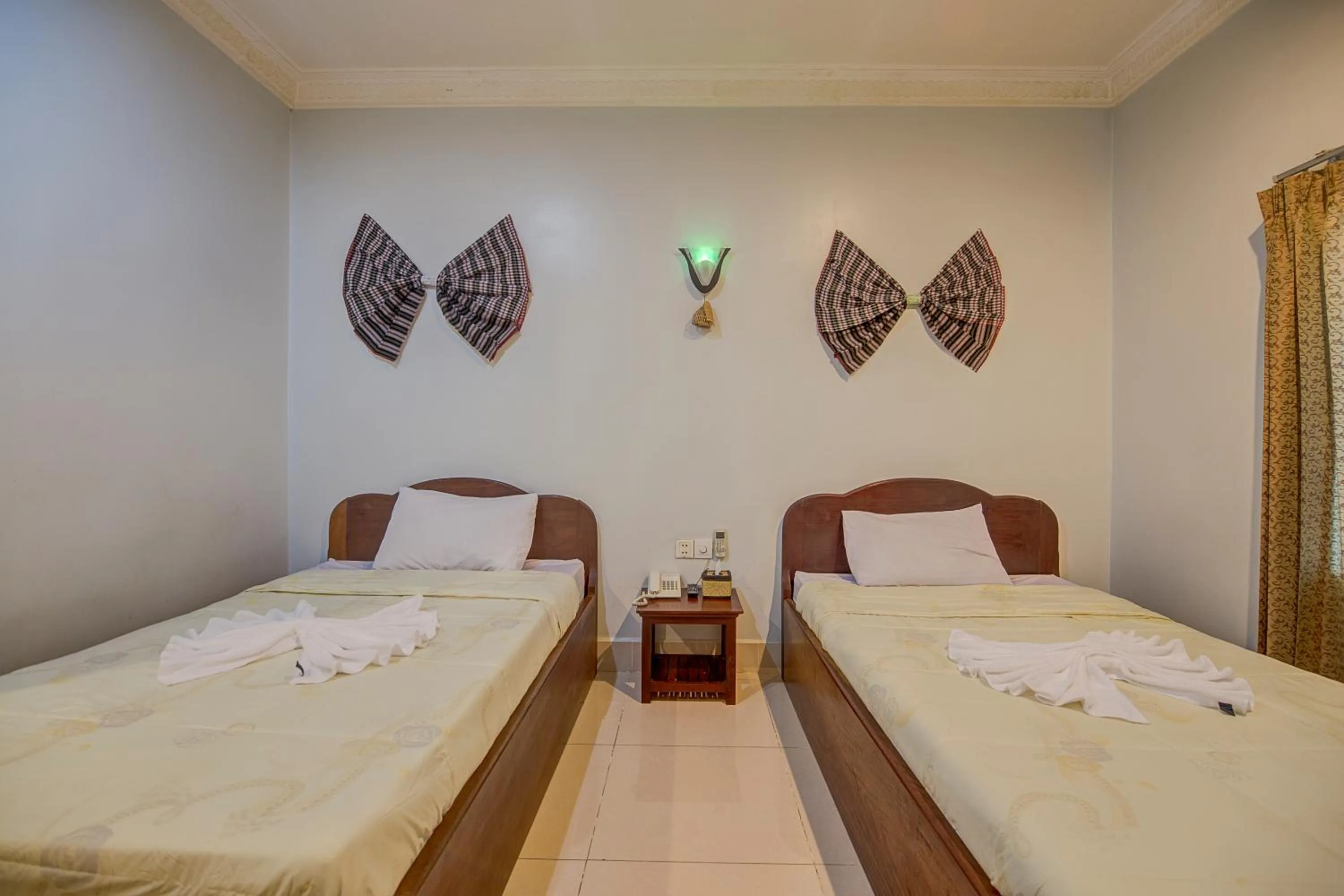 Photo of the whole room, Bed in DV Angkor Villa