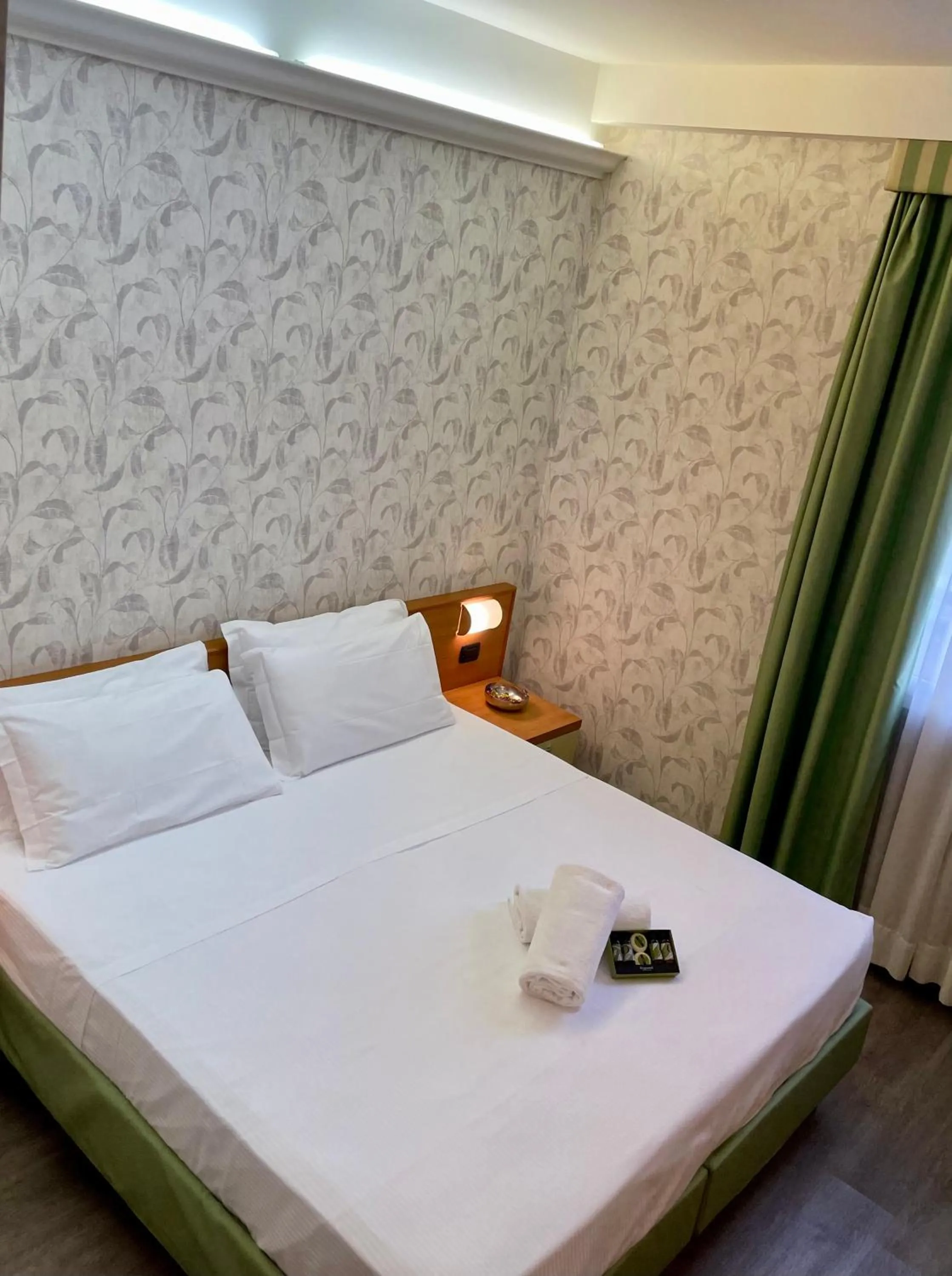 Bed in Hotel Embassy