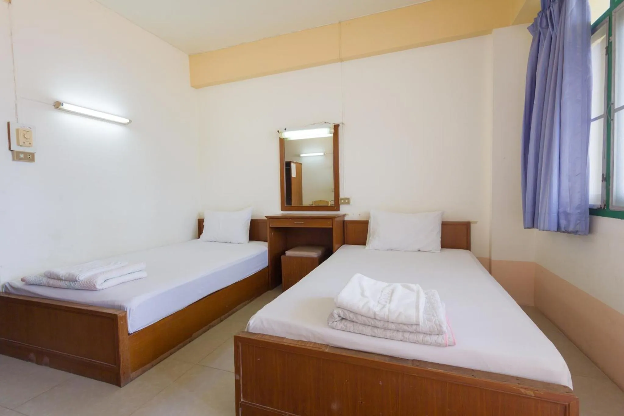 Bed in Mont Talay Hotel