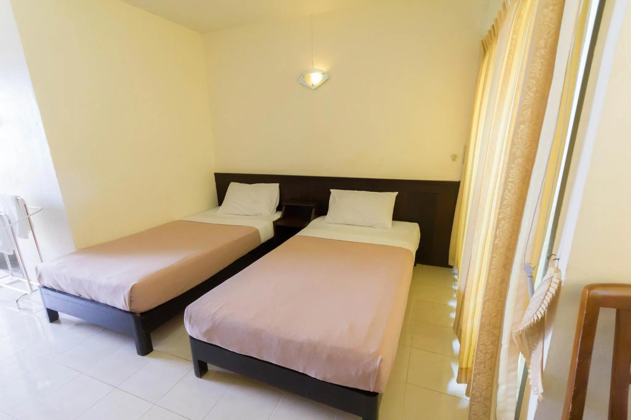 Bed in Mont Talay Hotel