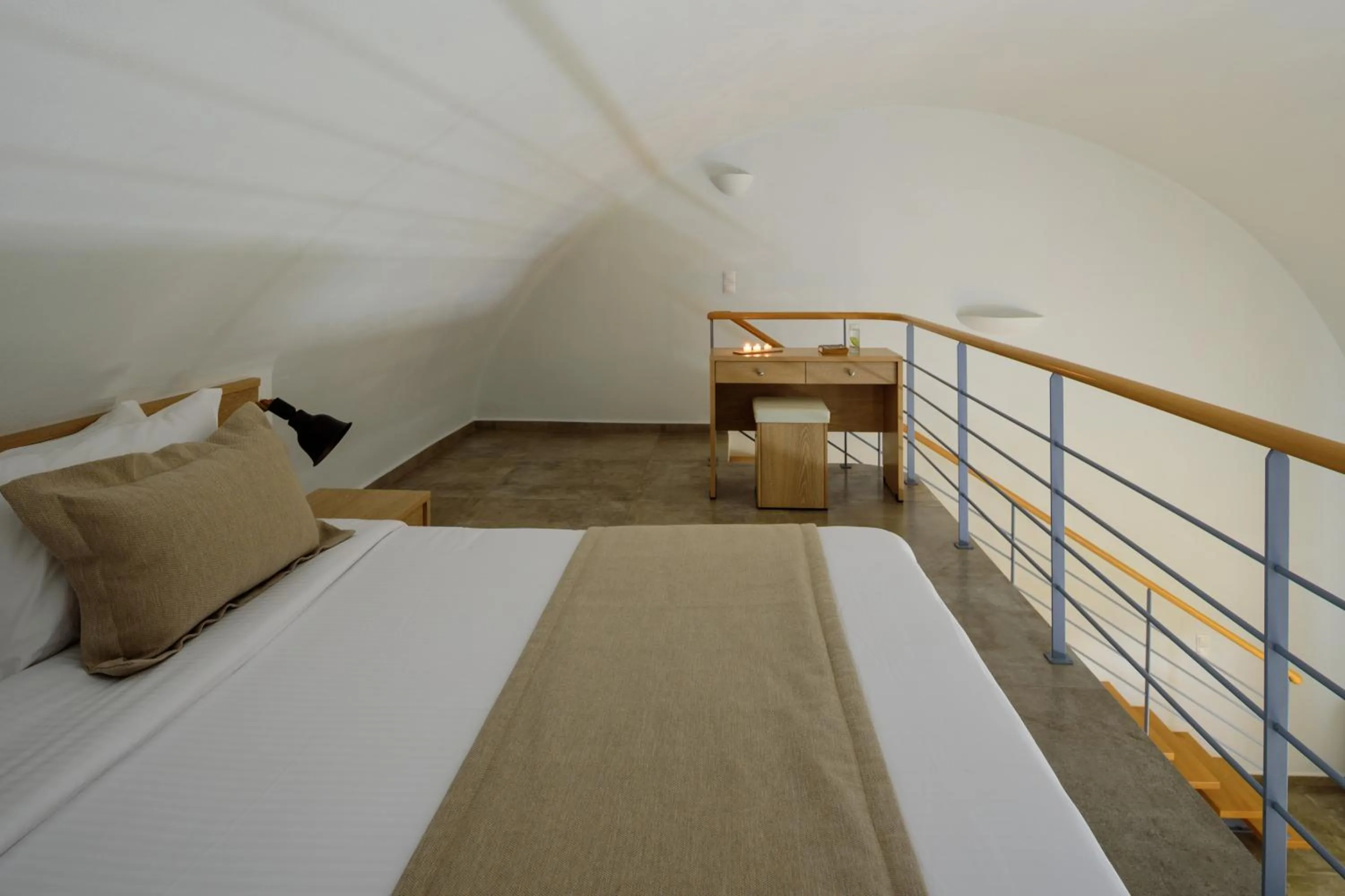 Bed in Aliter Suites