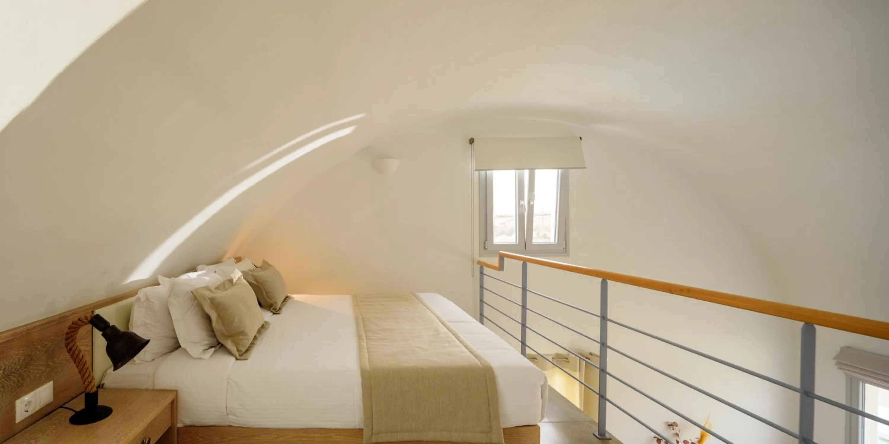 Bed in Aliter Suites