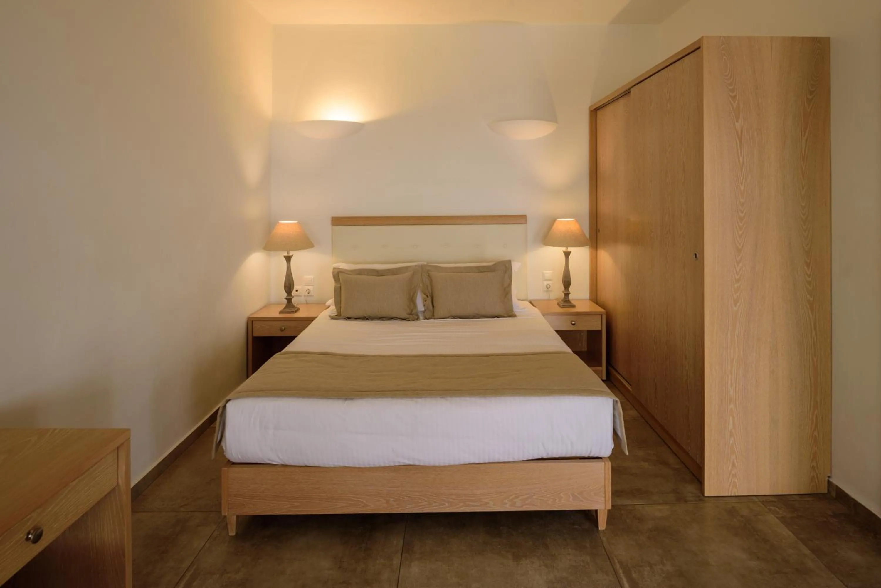 Bed in Aliter Suites