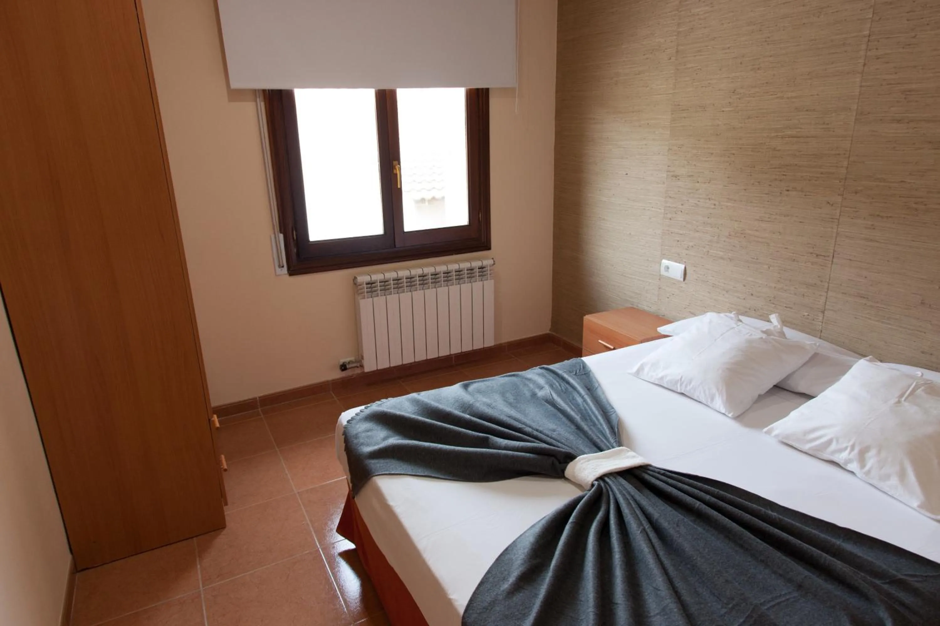 Bedroom, Bed in Apartamentos Río Guadalaviar