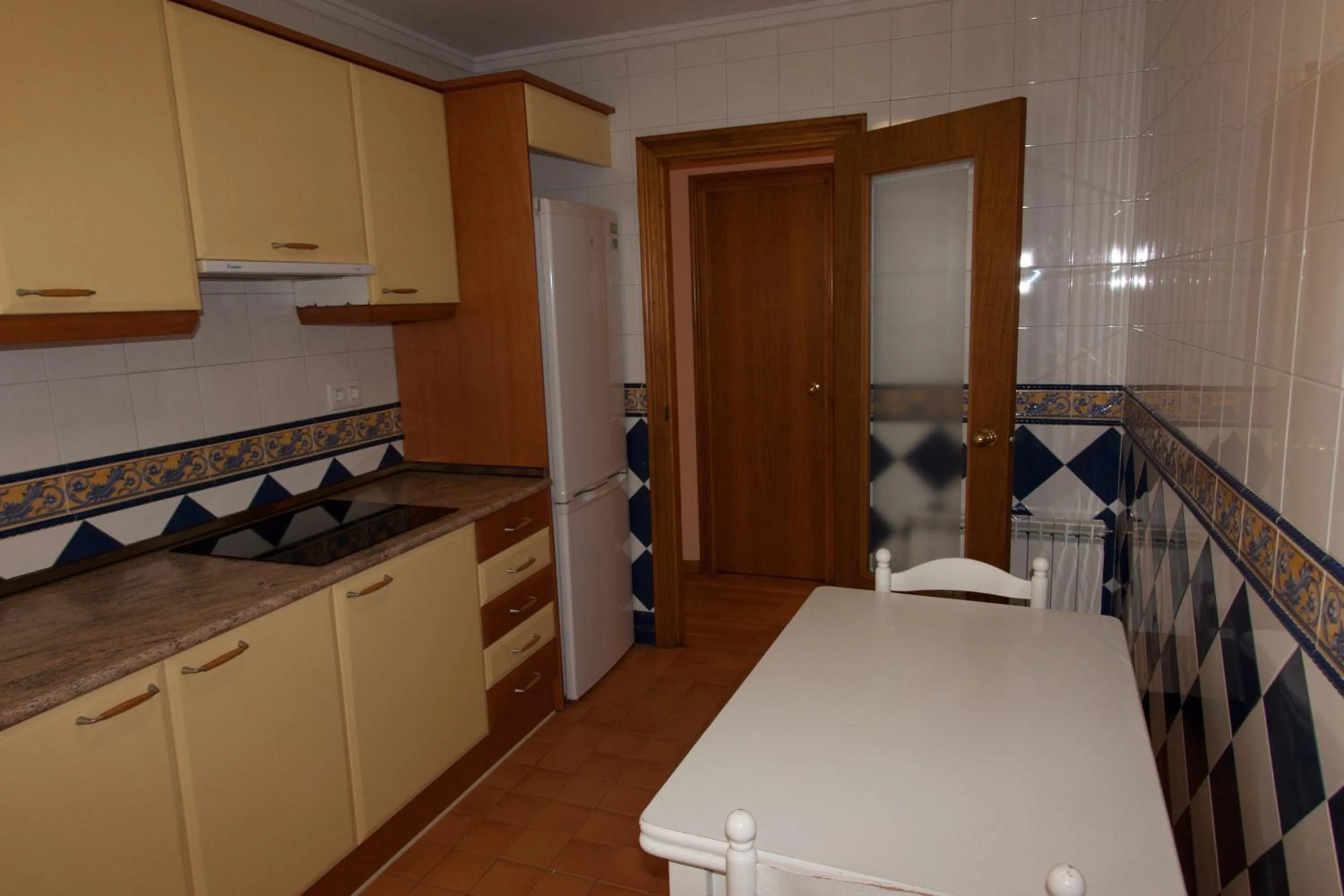Kitchen or kitchenette in Apartamentos Río Guadalaviar