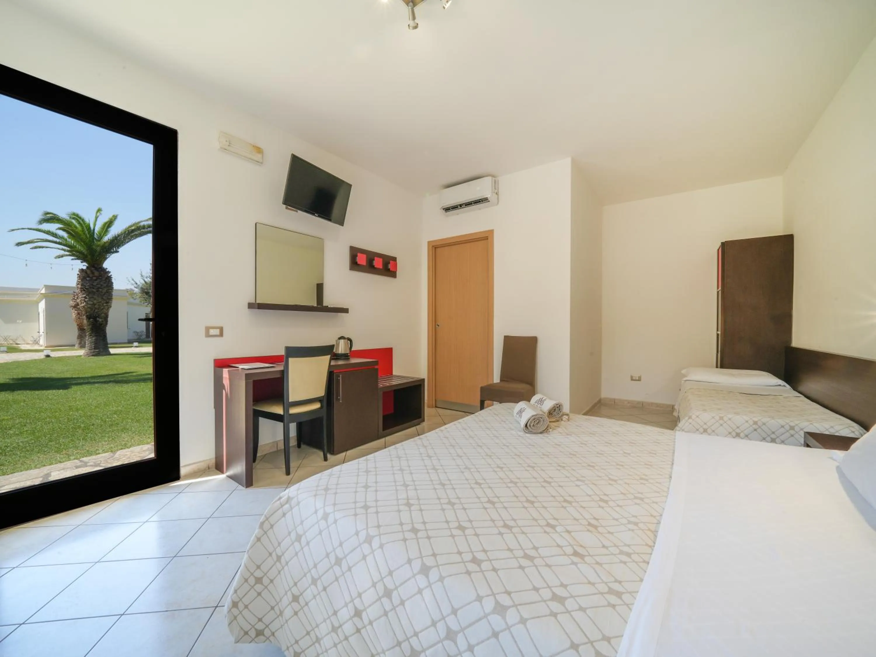 Communal lounge/ TV room in Resort Villa Hermosa