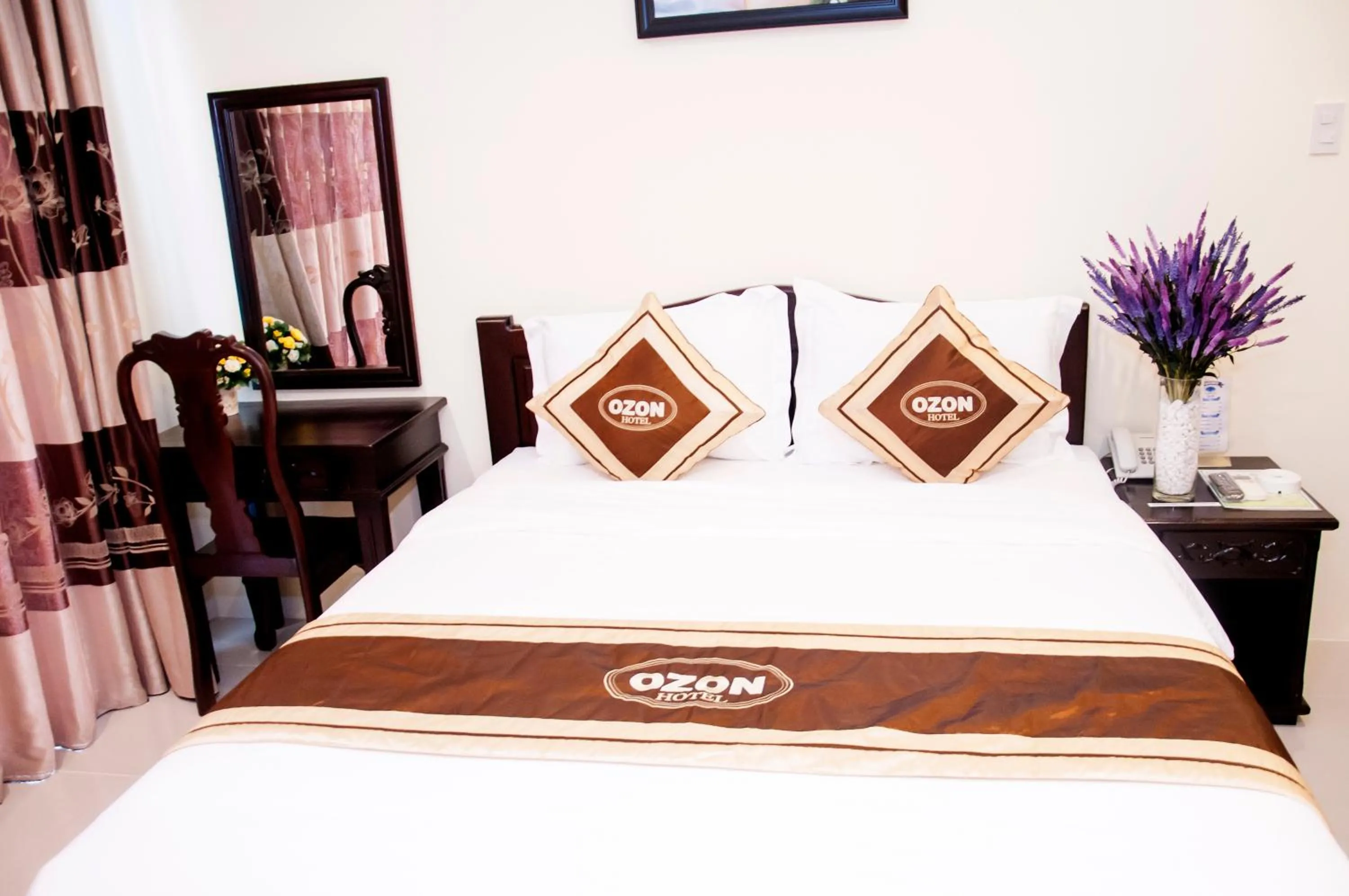 Bed in Ozon Hotel