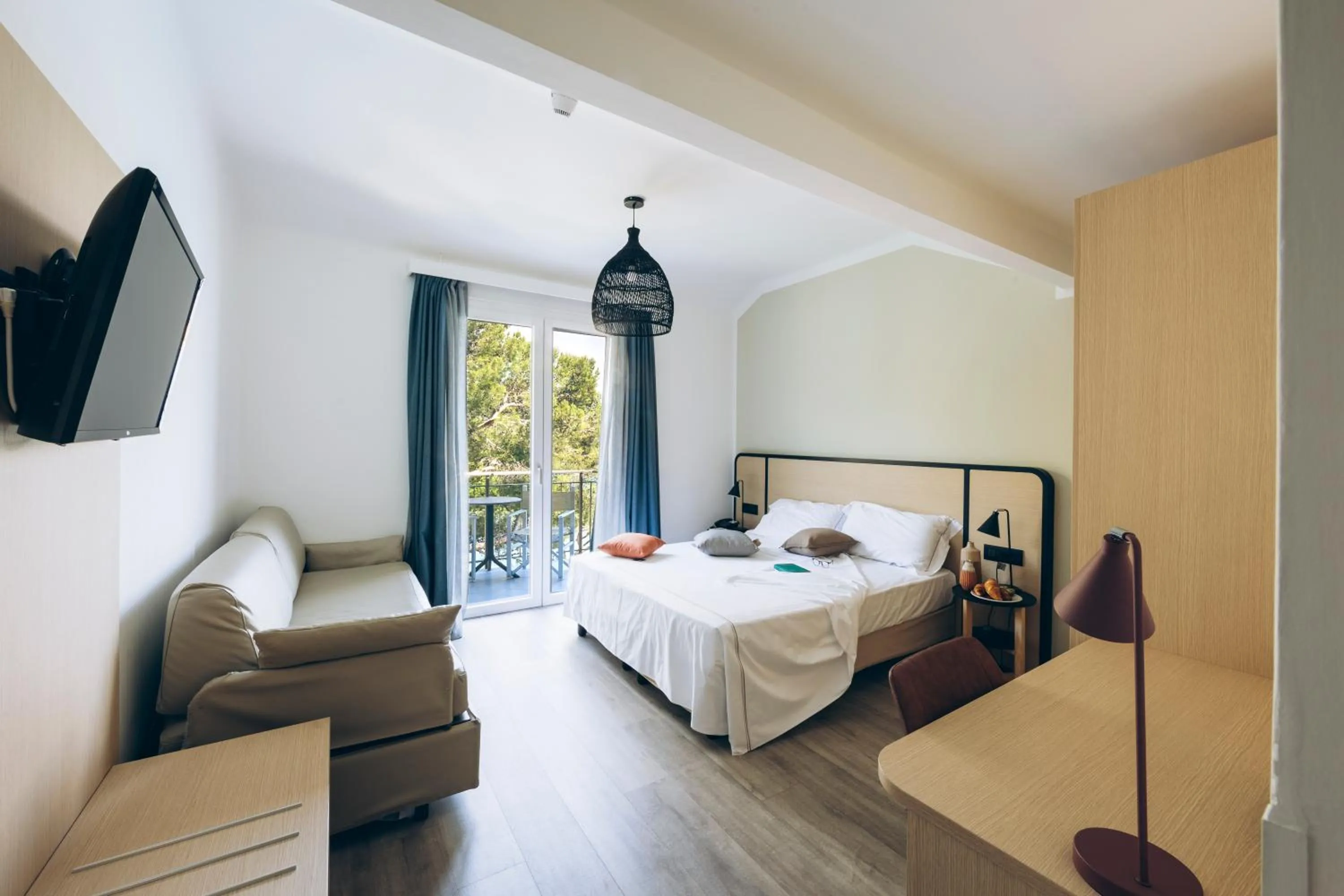 Bed in Hotel Arc En Ciel