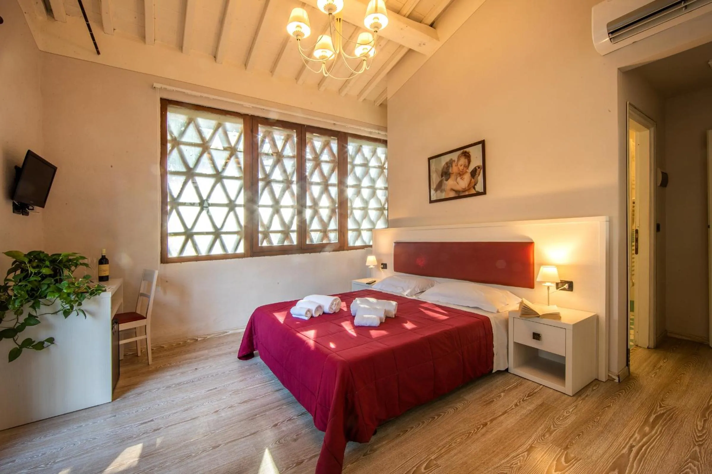 Bedroom, Bed in hu Norcenni Girasole village