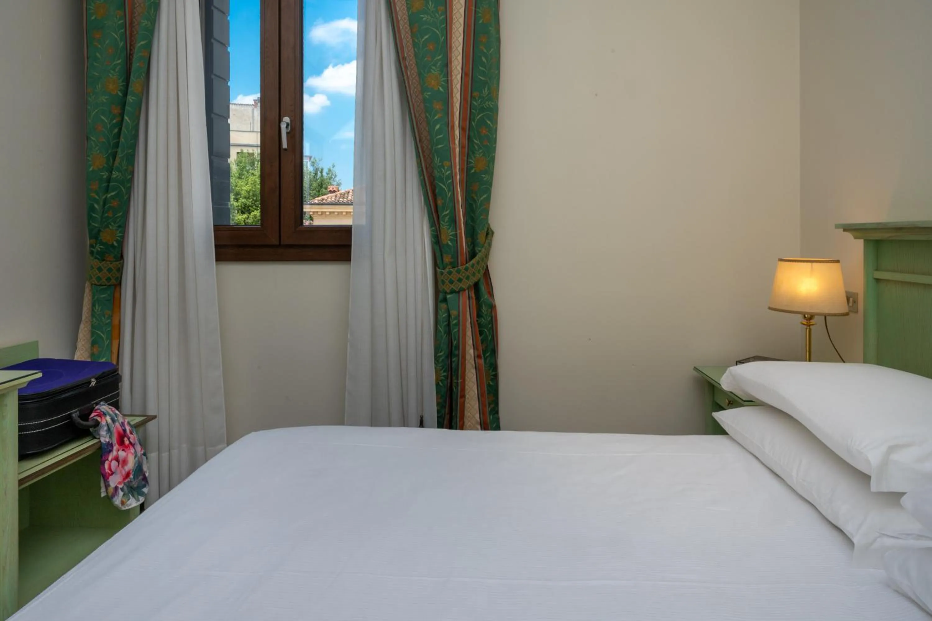 Bed in Hotel Donatello