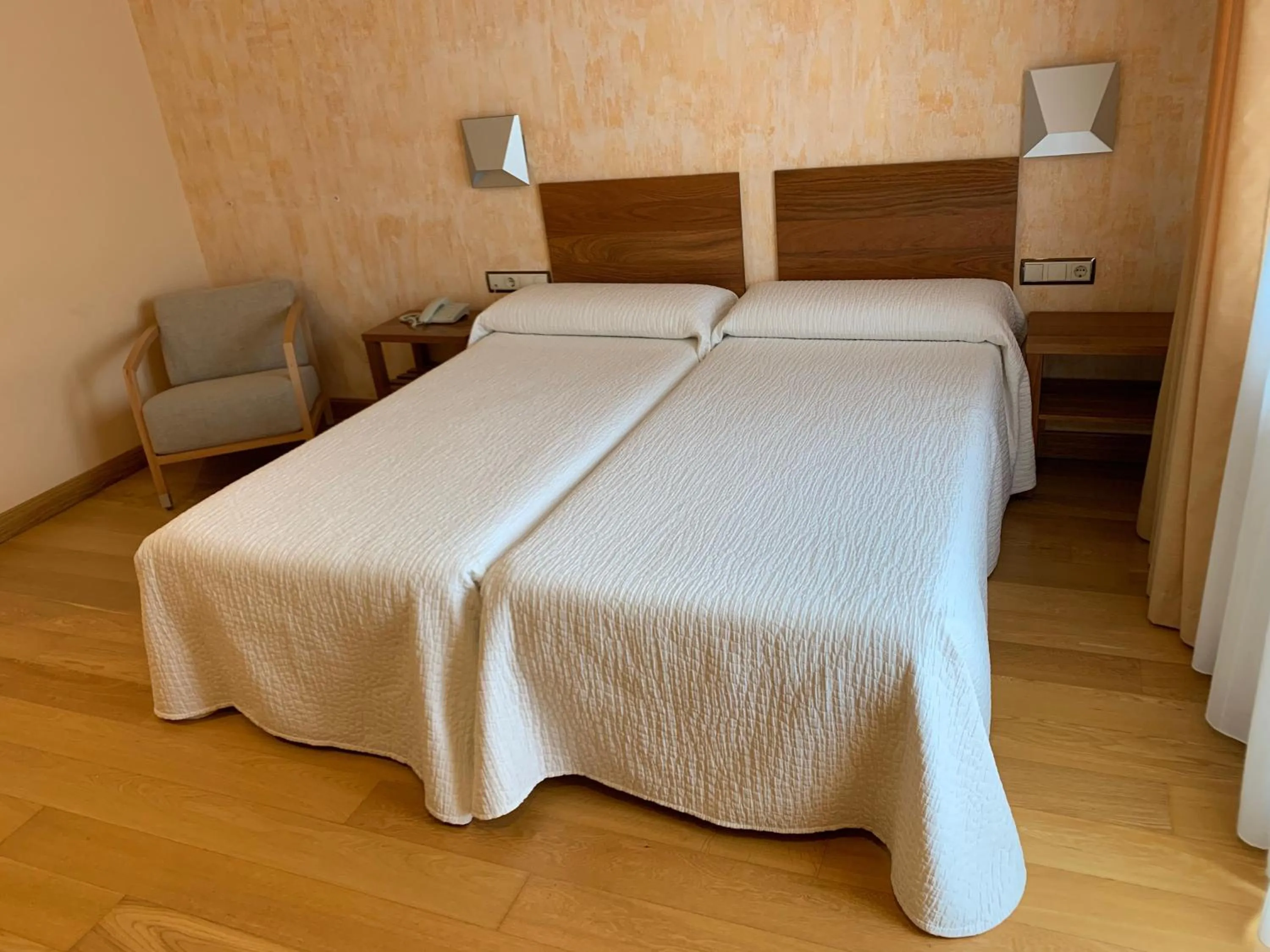 Bed in Hotel Los Nogales