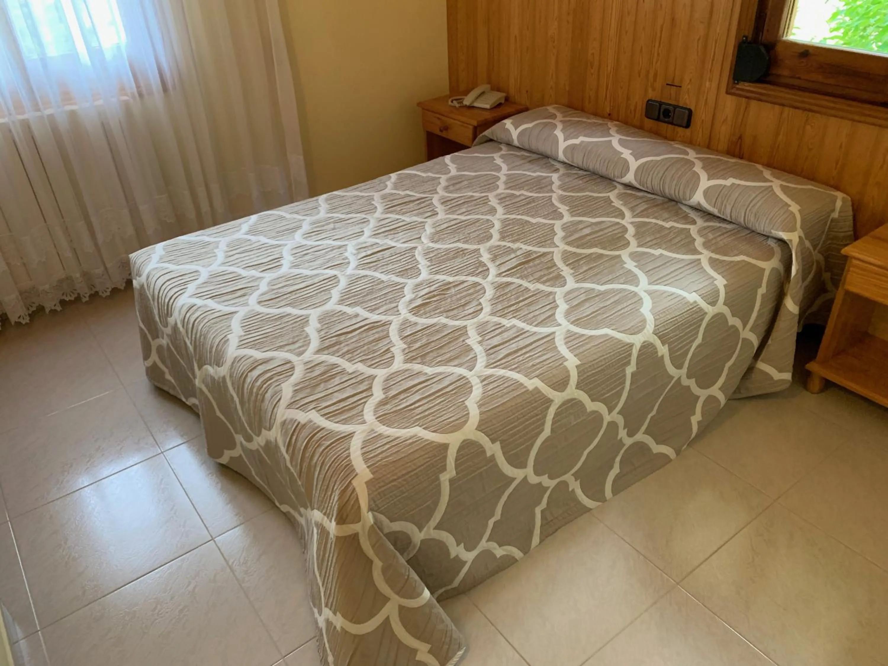 Bed in Hotel Los Nogales