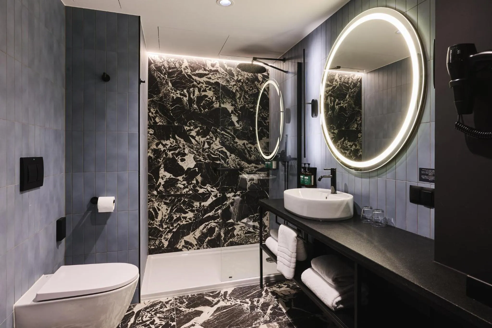 Bathroom in voco Katowice by IHG