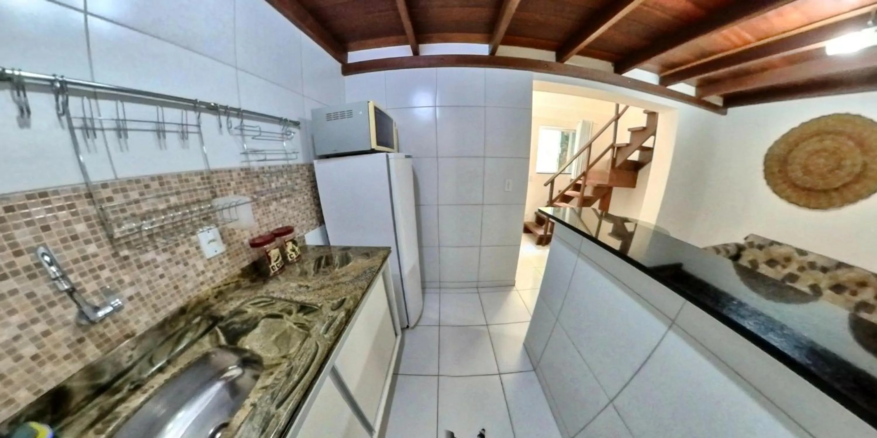 Kitchen or kitchenette in Pousada Mar e Brisa