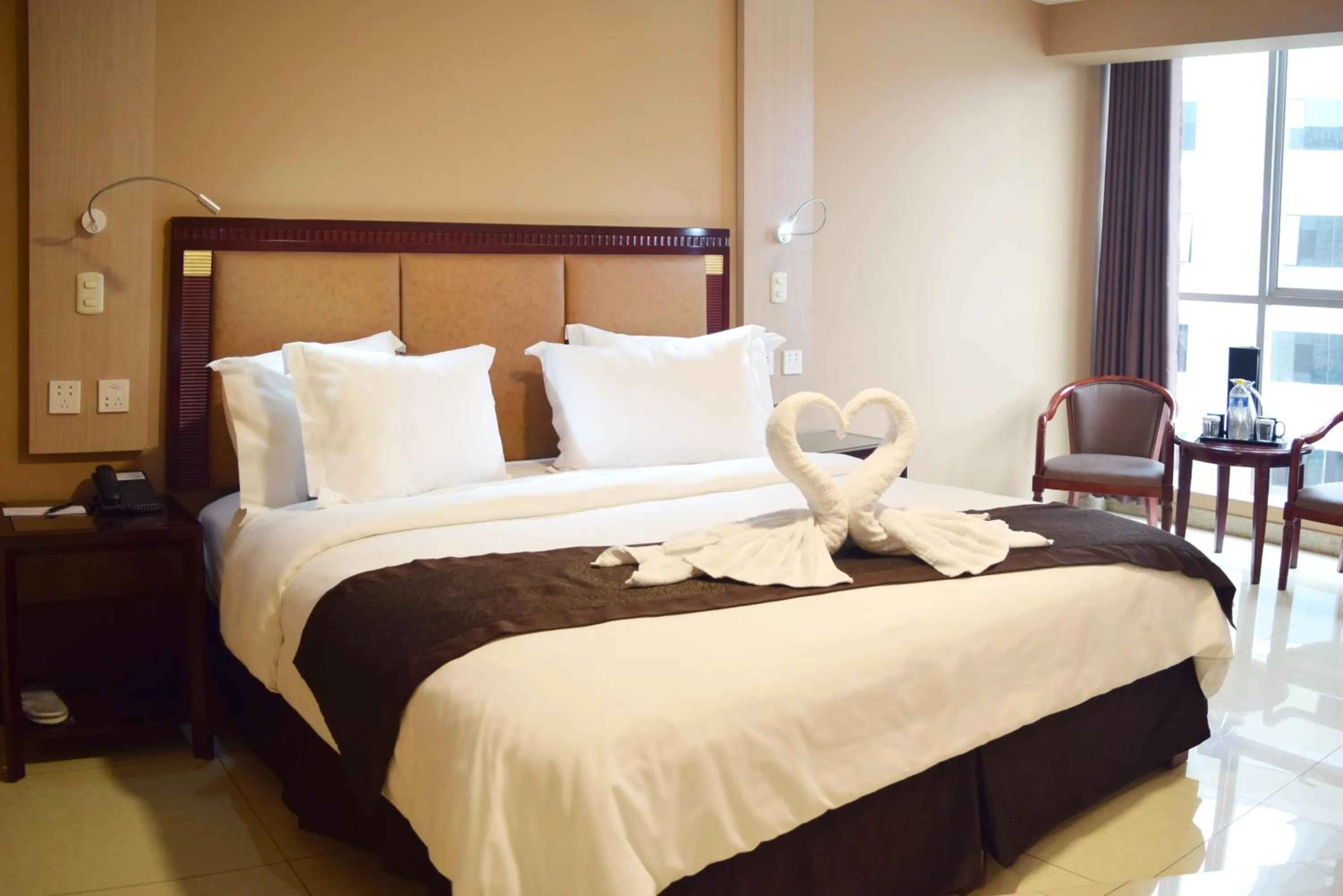 Photo of the whole room, Bed in Gran Mundo Hotel & Suites