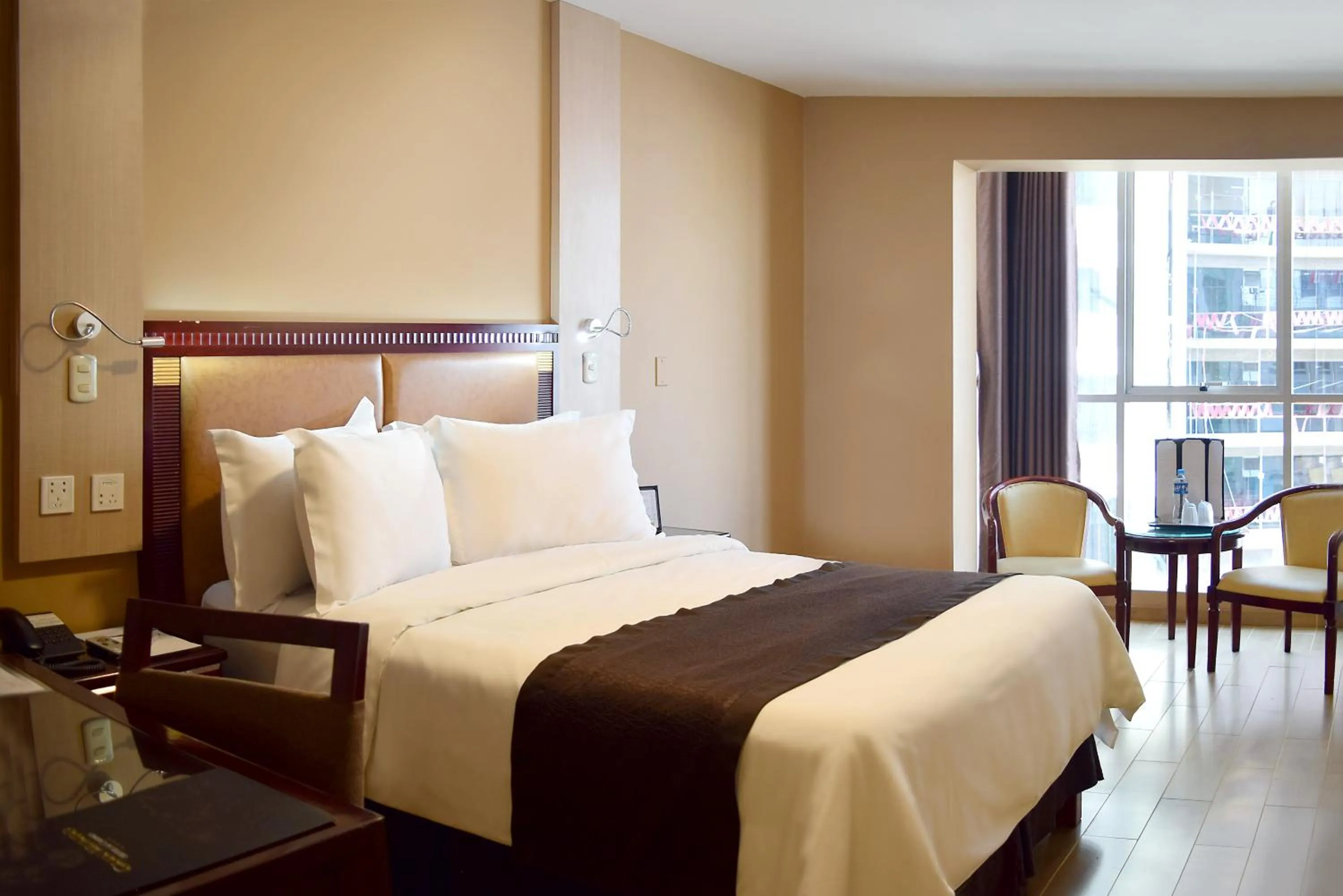 Photo of the whole room, Bed in Gran Mundo Hotel & Suites