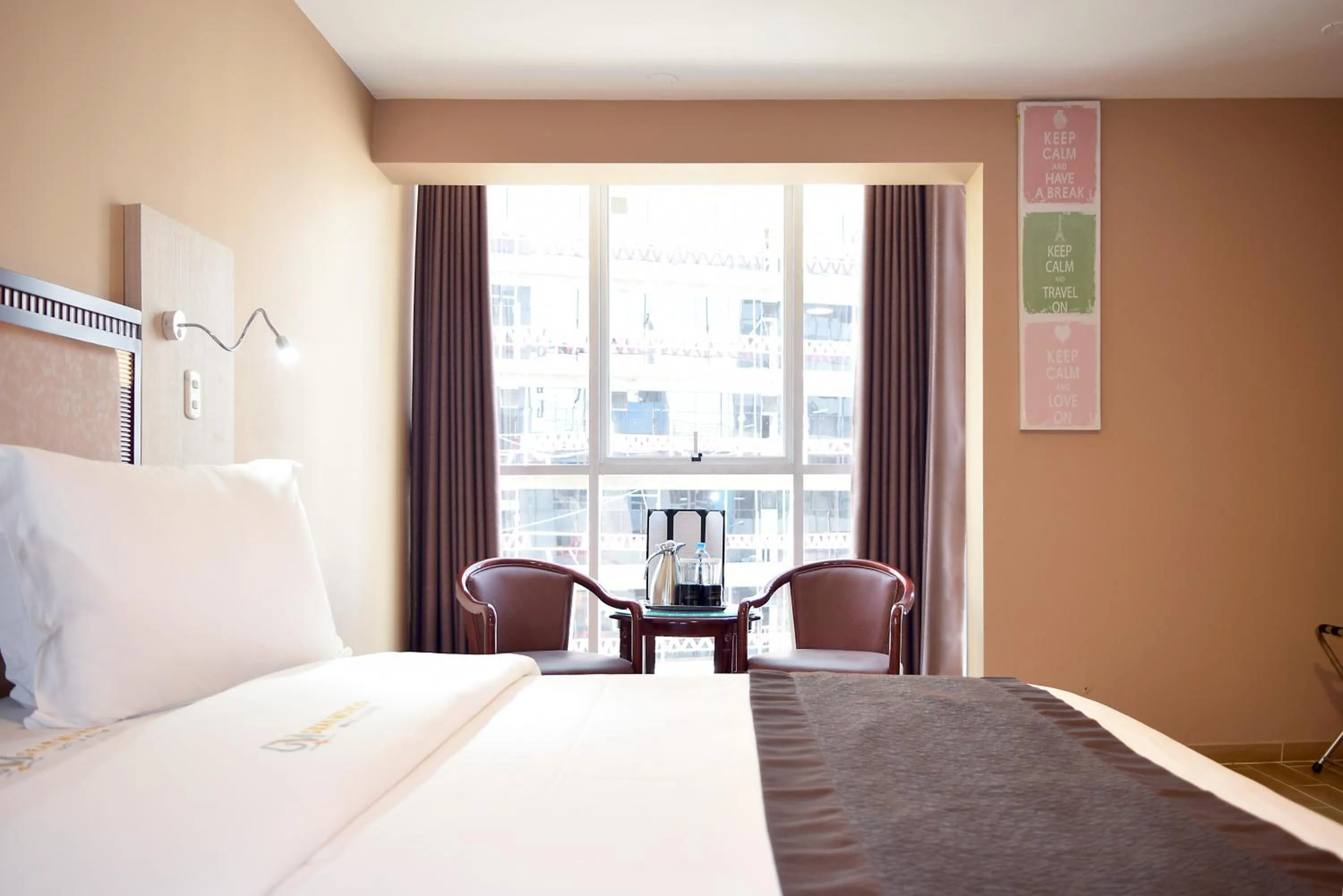 Photo of the whole room, Bed in Gran Mundo Hotel & Suites