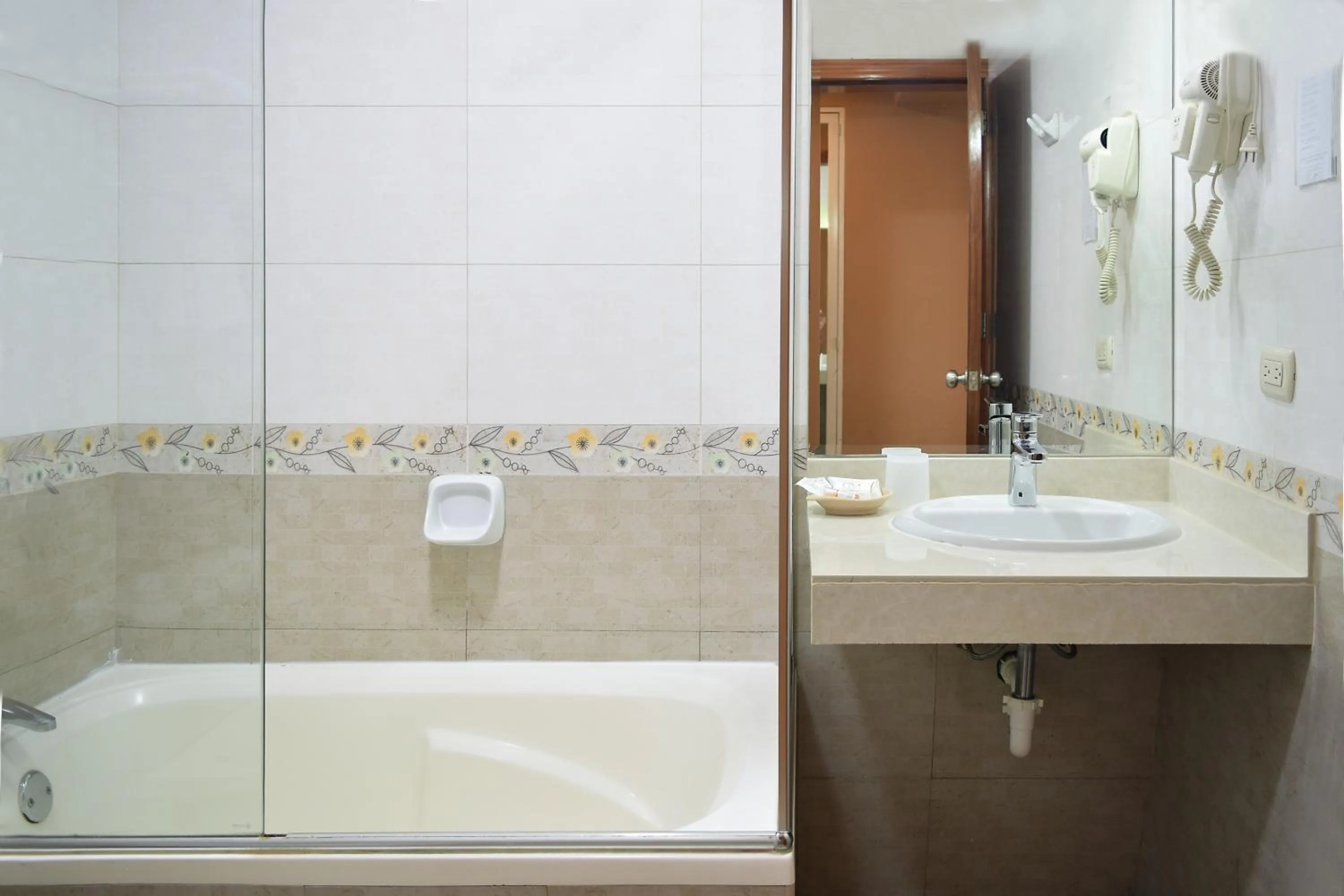 Bathroom in Gran Mundo Hotel & Suites