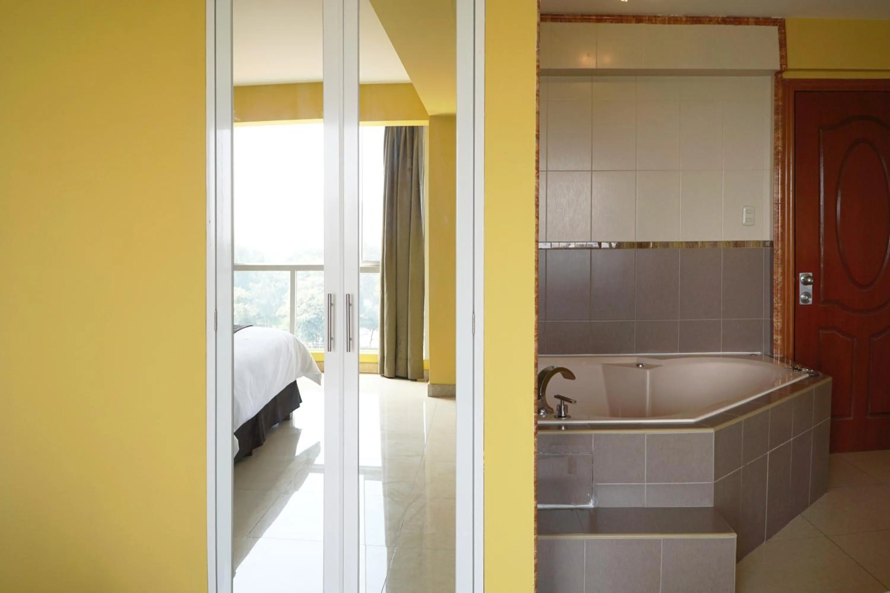 Bathroom in Gran Mundo Hotel & Suites