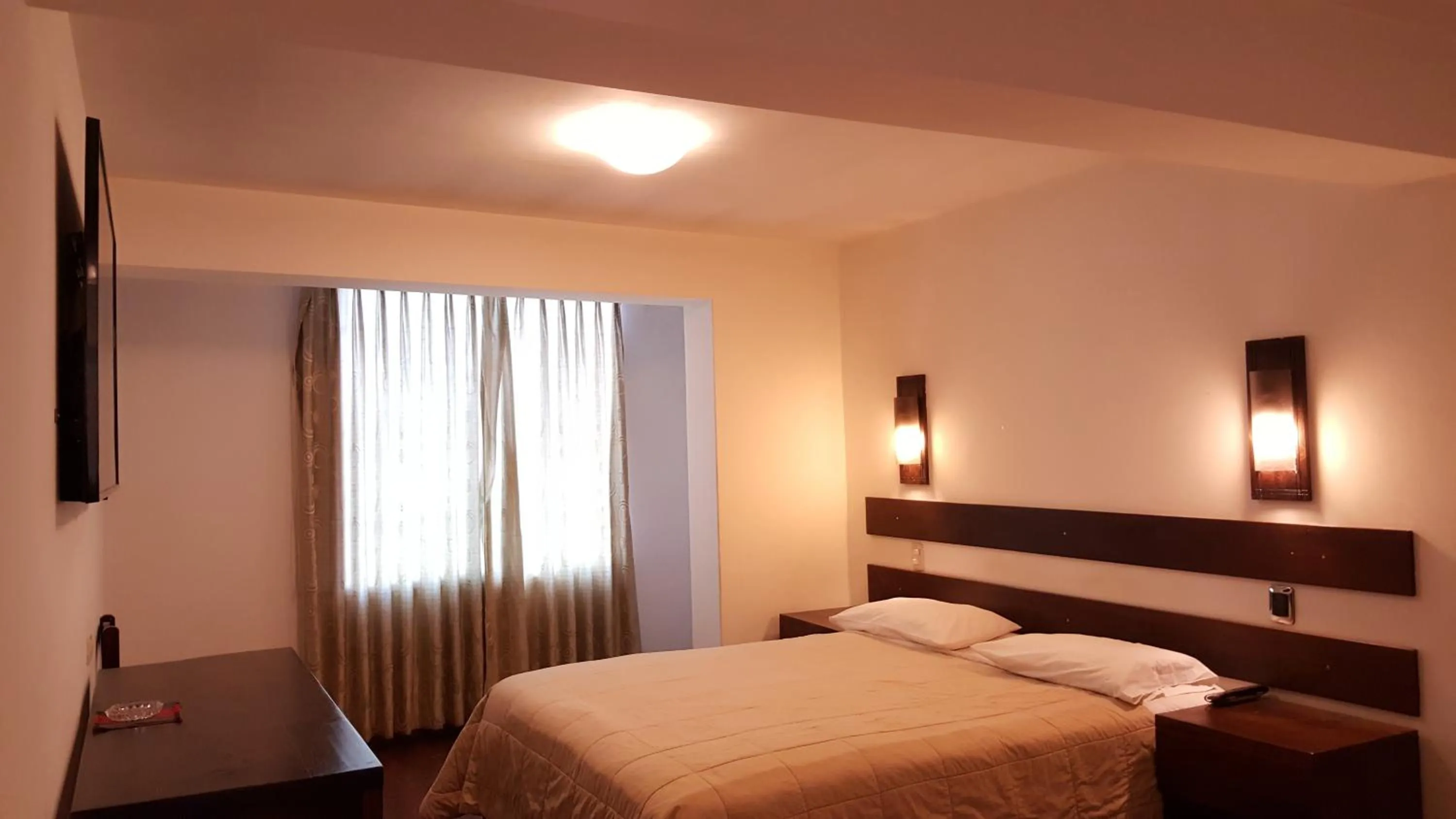 Bed in La Cabaña Hotel