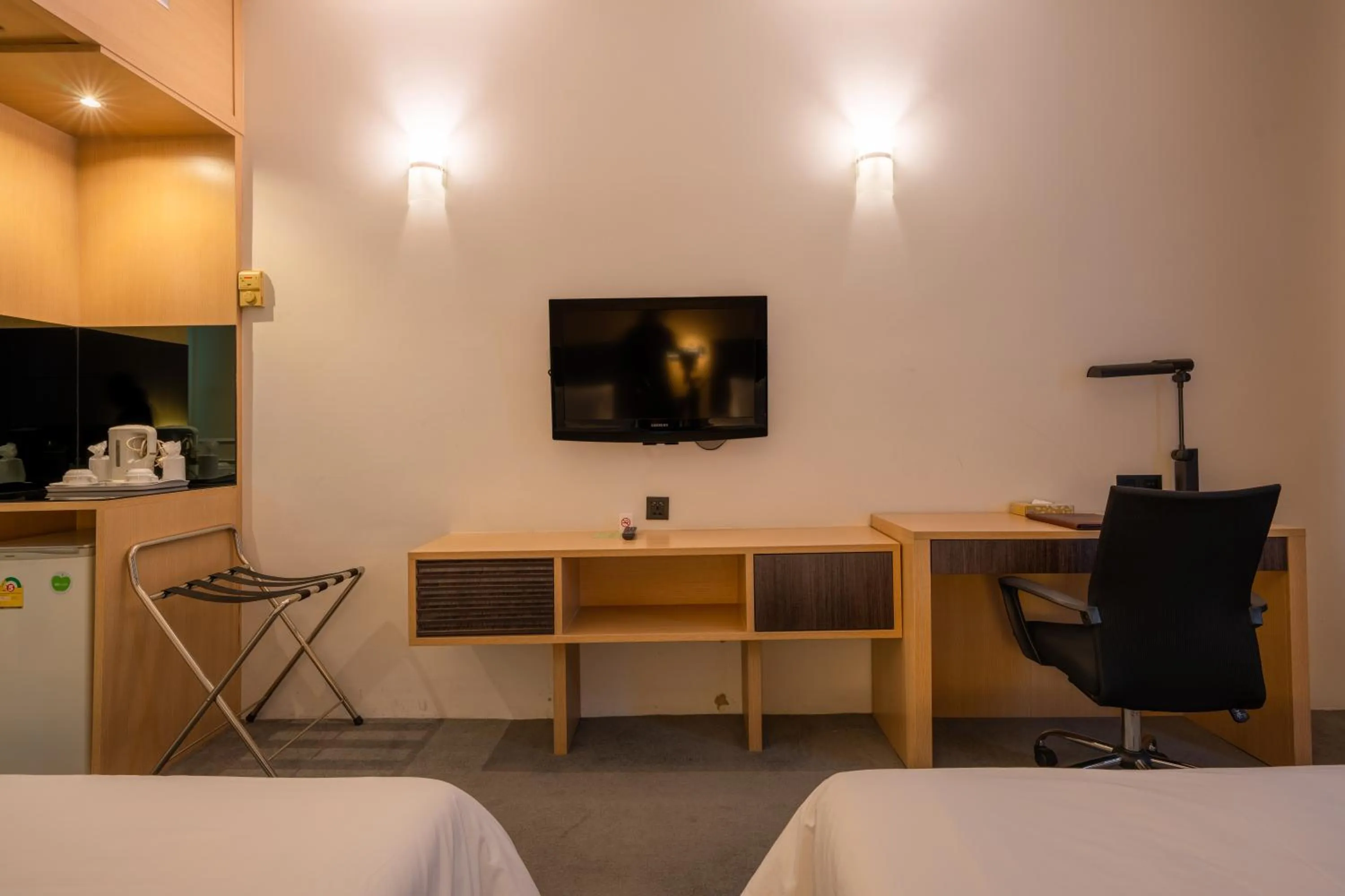 Bed in Ariston Hotel Bangkok