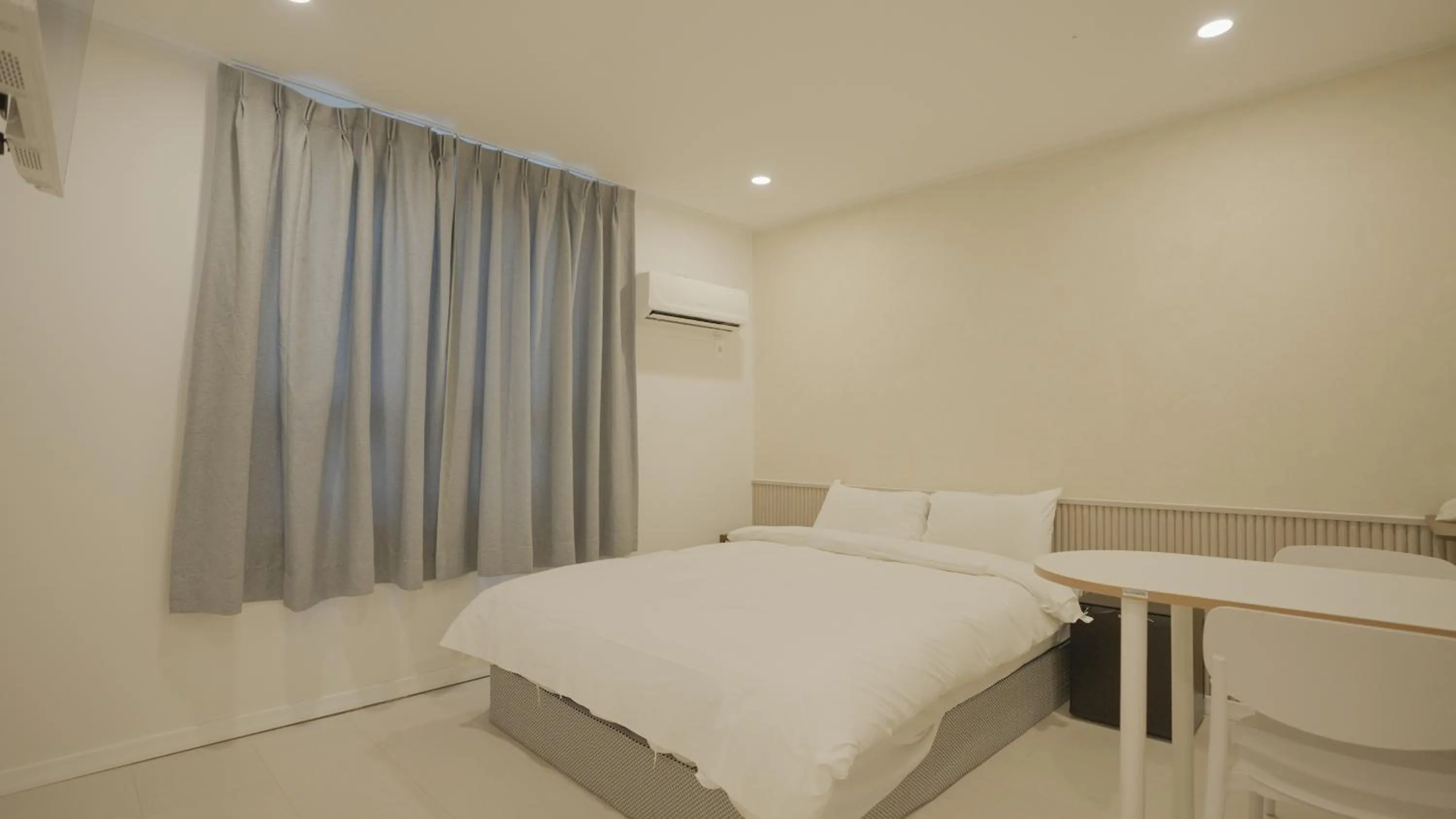 Bed in Jeju Stay Hotel